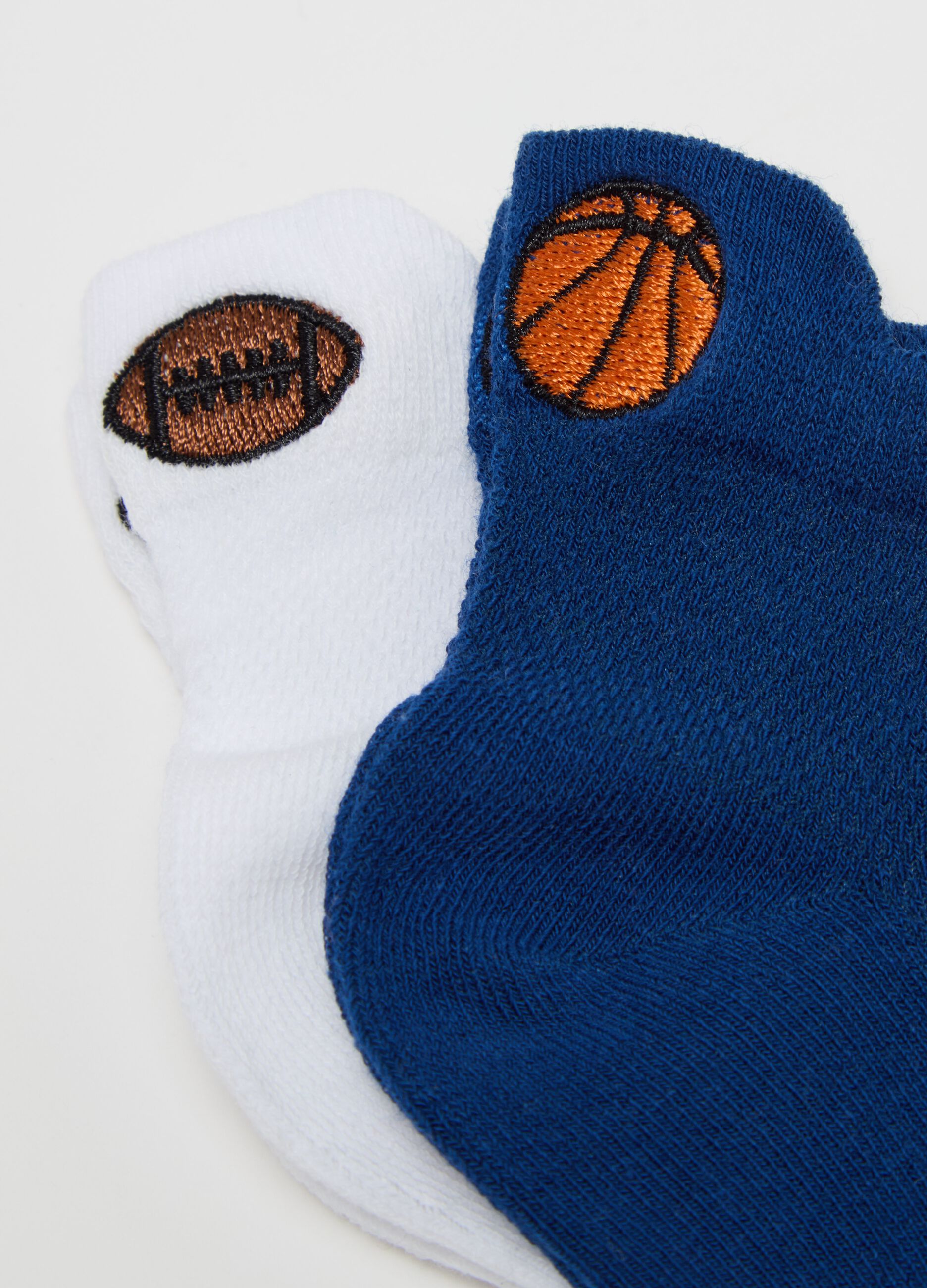 Three-pair pack shoe liners with sports motif embroidery