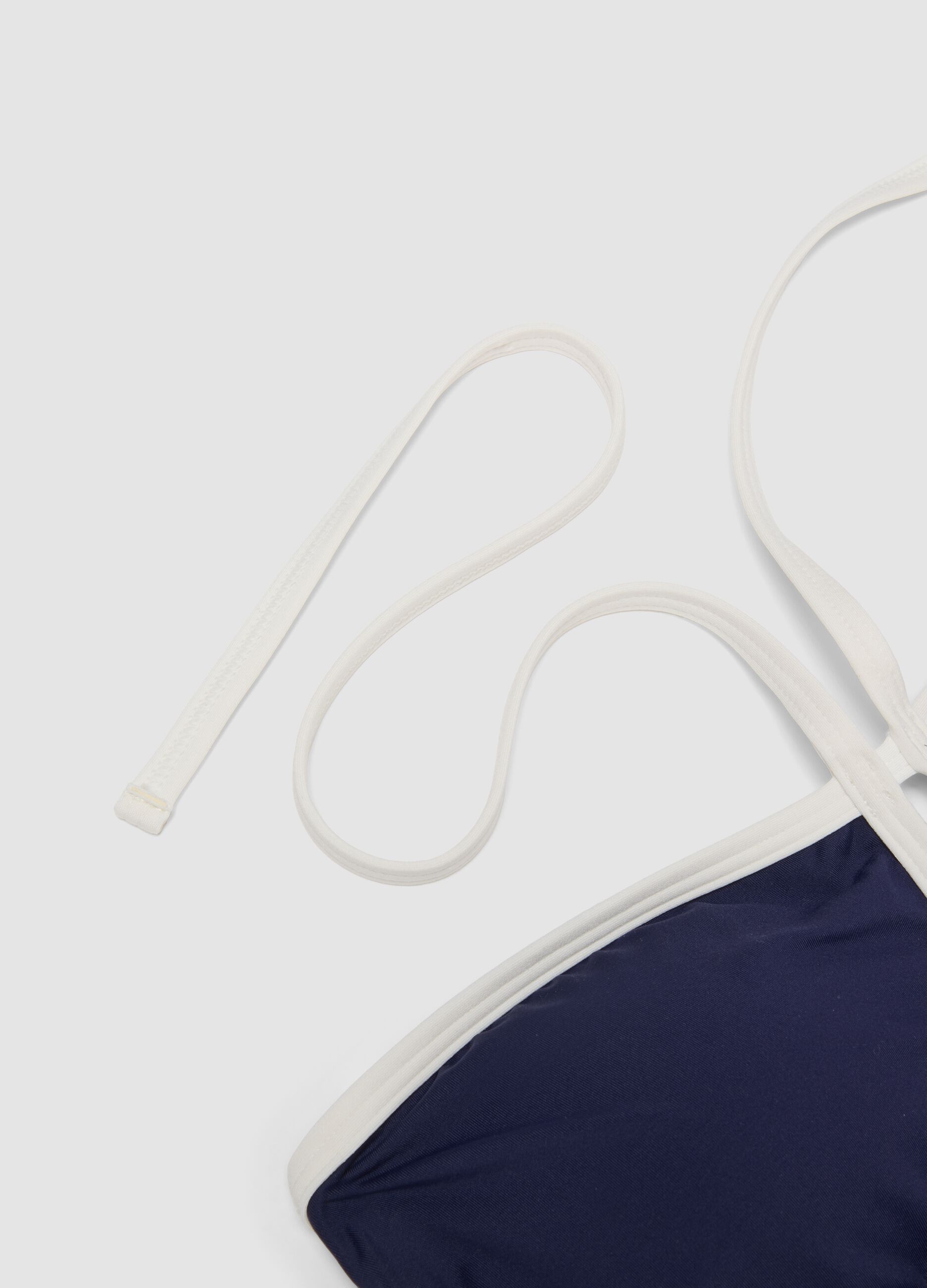 Blue stretch swimsuit with white piping