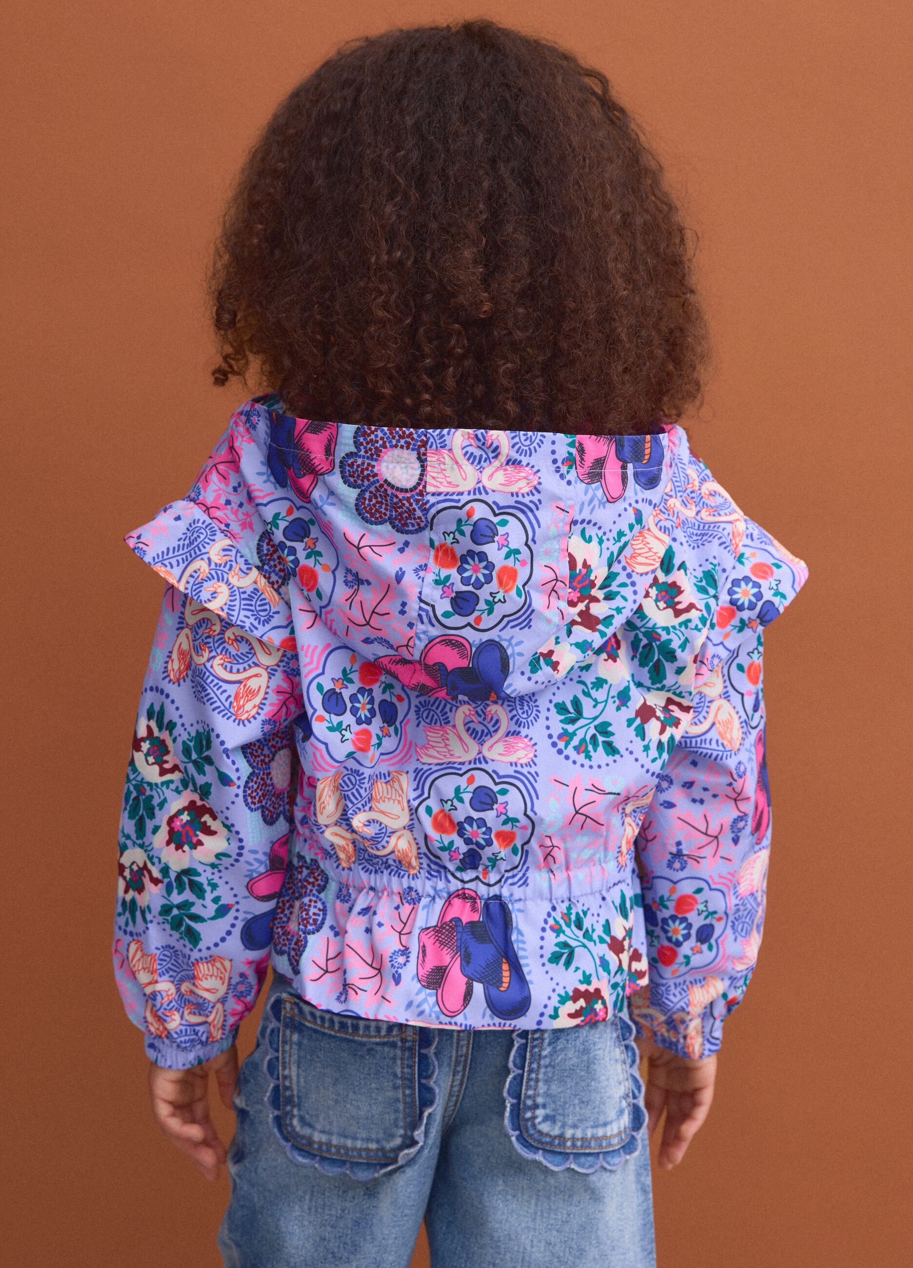 Girls&rsquo; multicolour hooded rain jacket with all-over print
