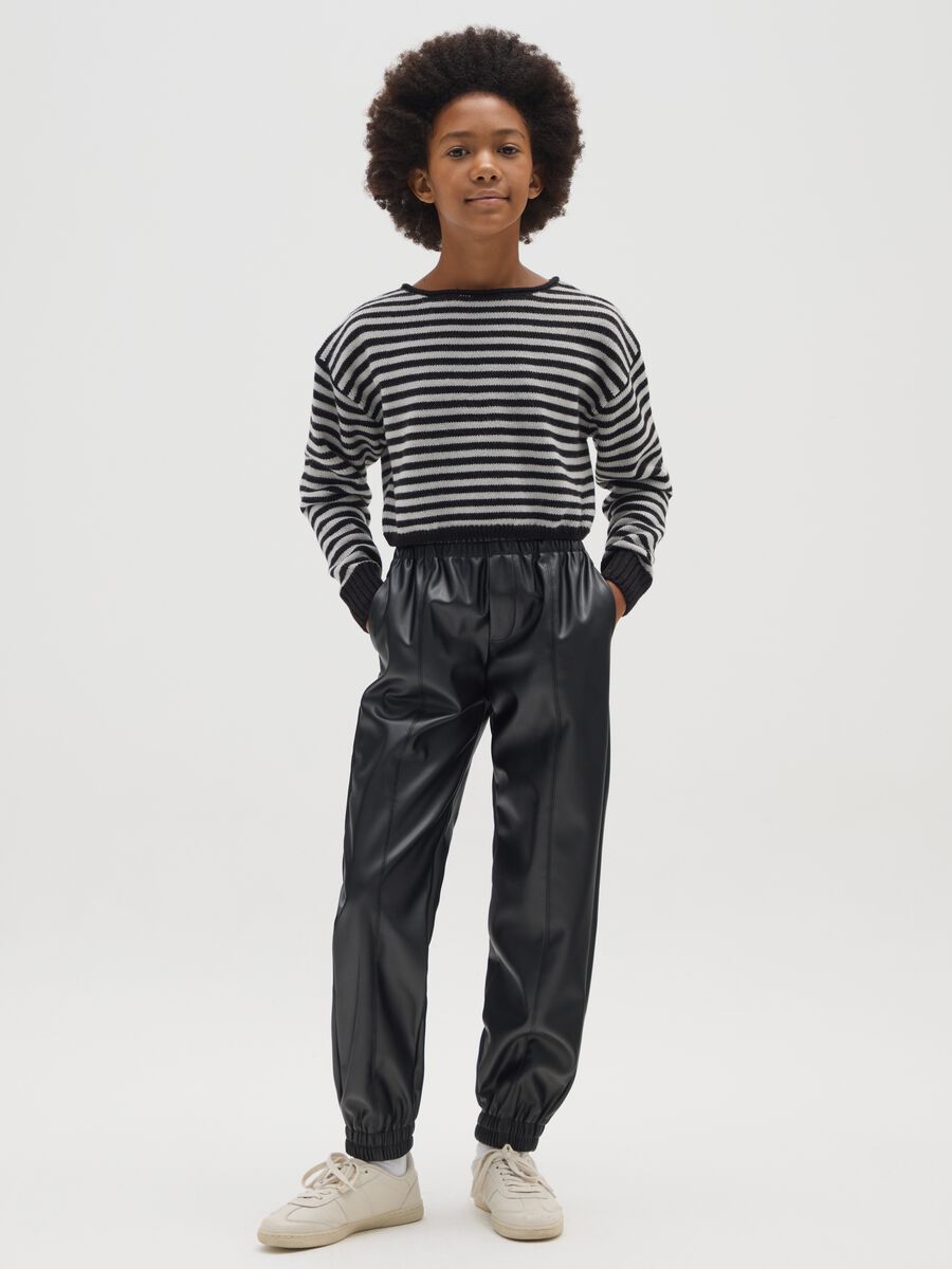 Black faux leather jogger trousers for girls_1