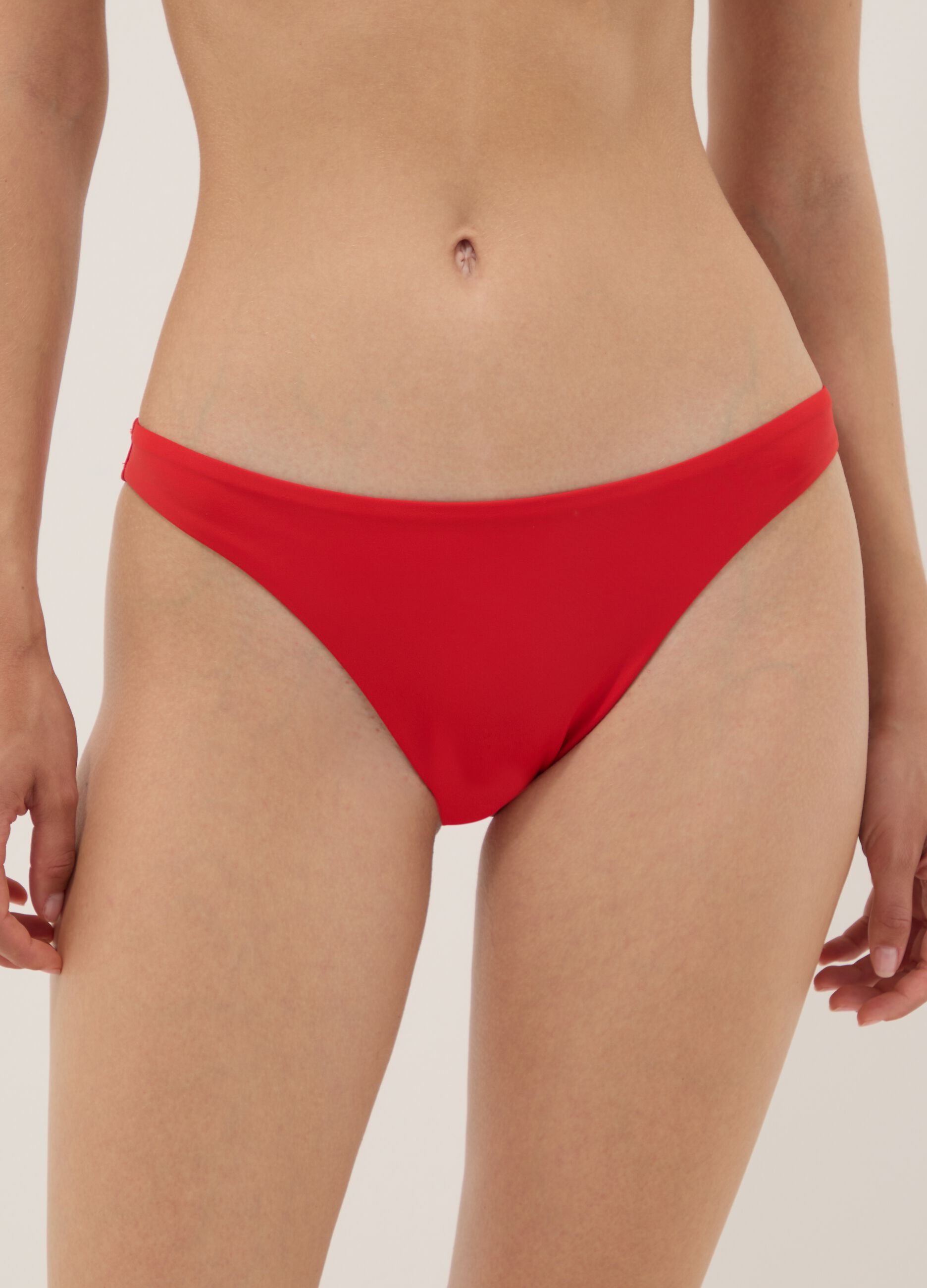 Slip bikini rosso in tessuto elasticizzato