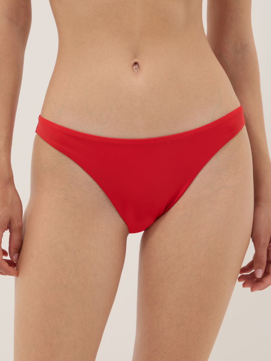 Slip bikini rosso in tessuto elasticizzato_1
