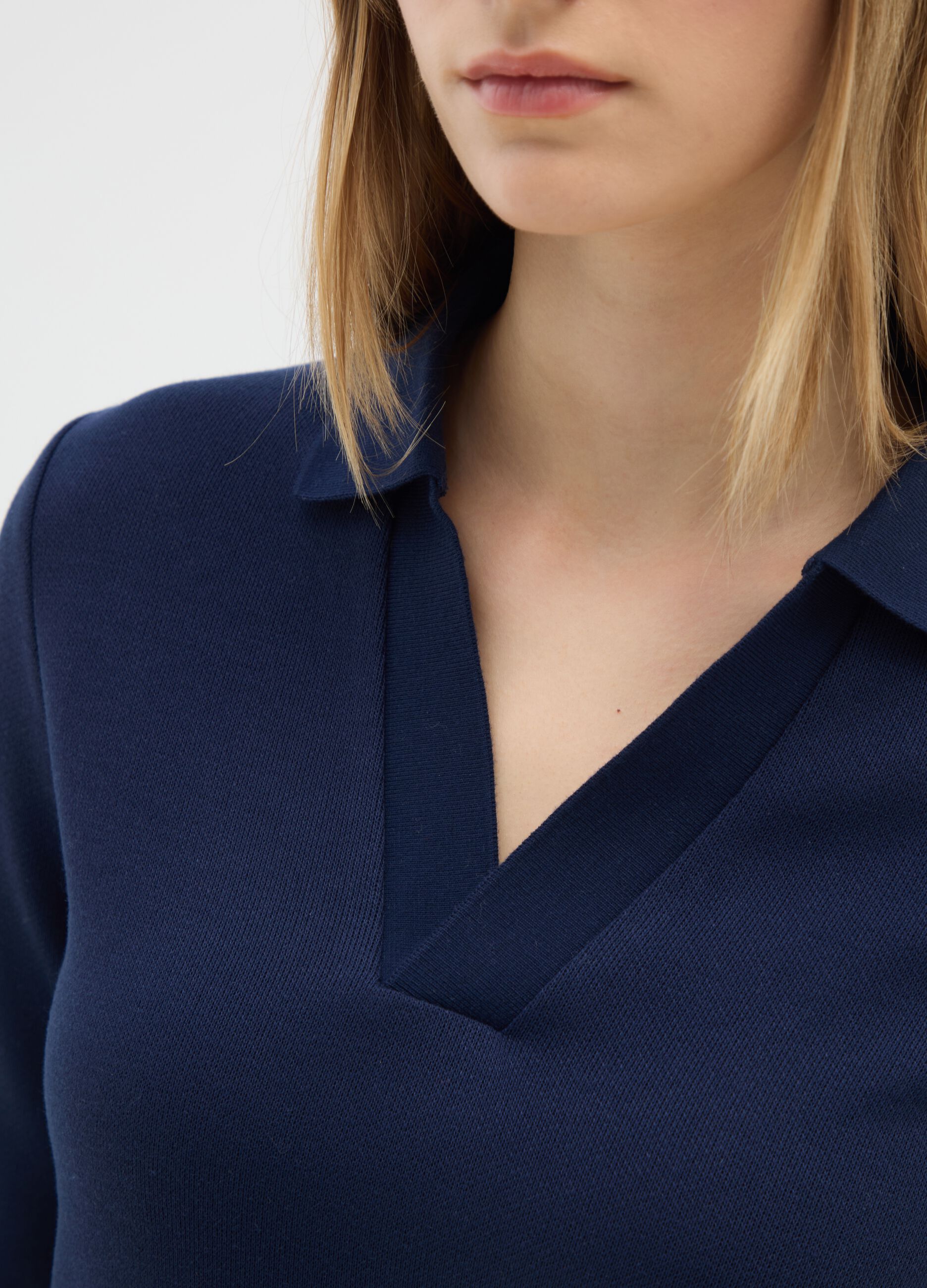 Polo blu a maniche lunghe elasticizzata