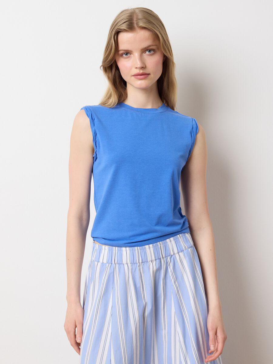 Light blue vest with rolled detail_1