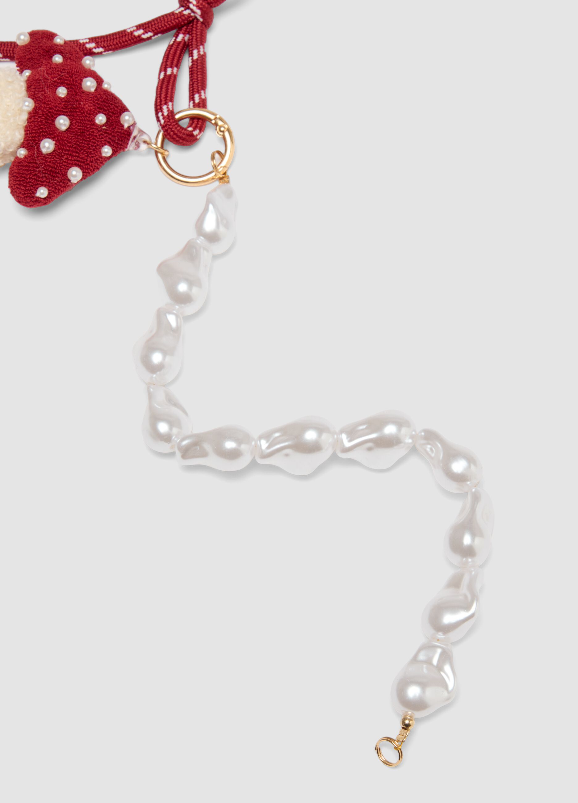 Red bracelet with hat charm and pearls