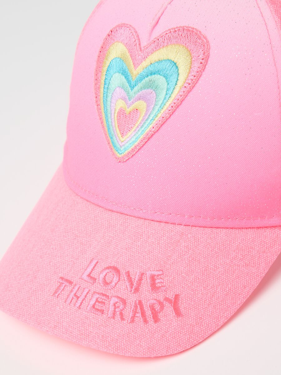 Pink cap with multicoloured heart_1