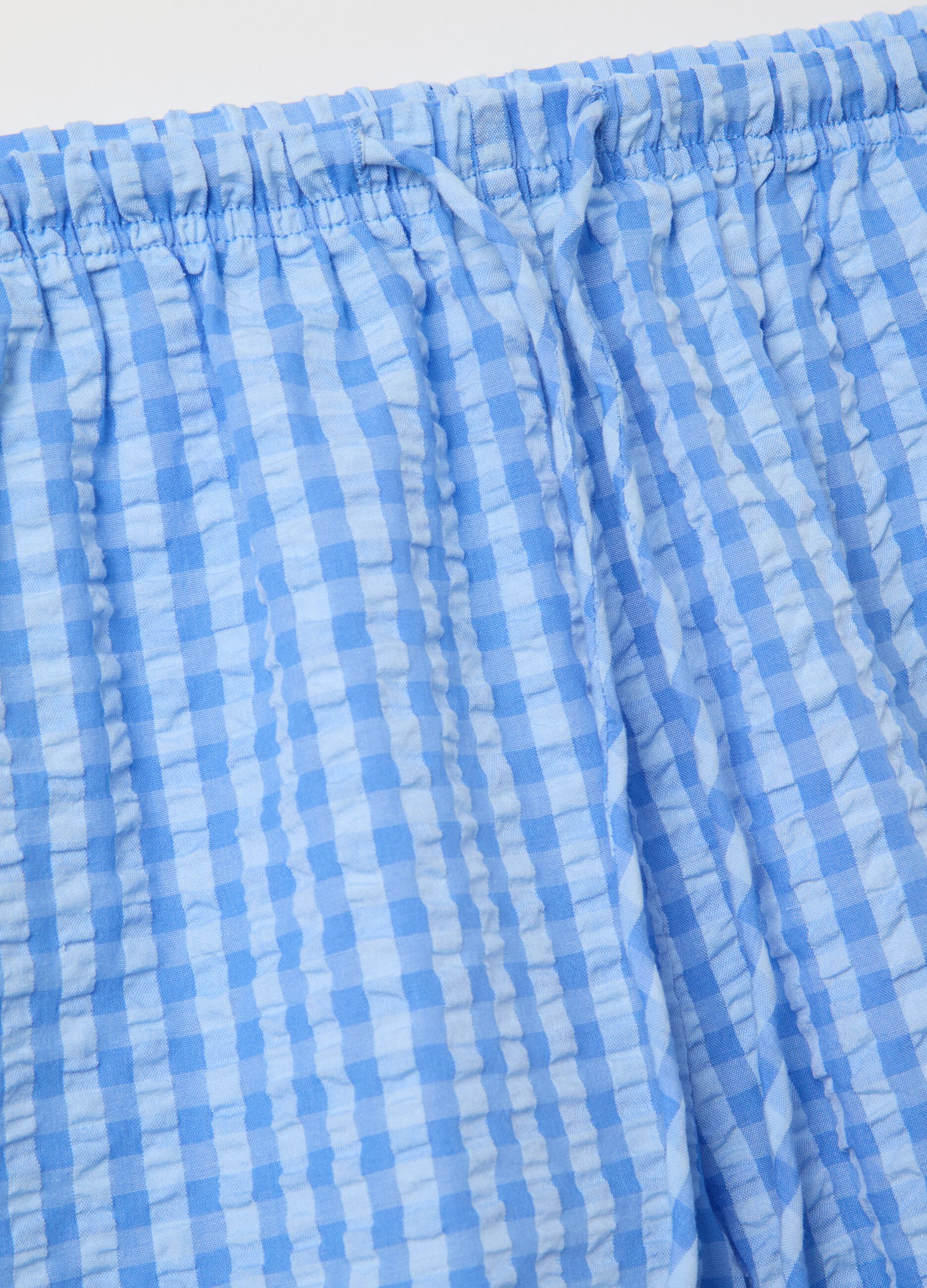 Light blue shorts in striped cotton
