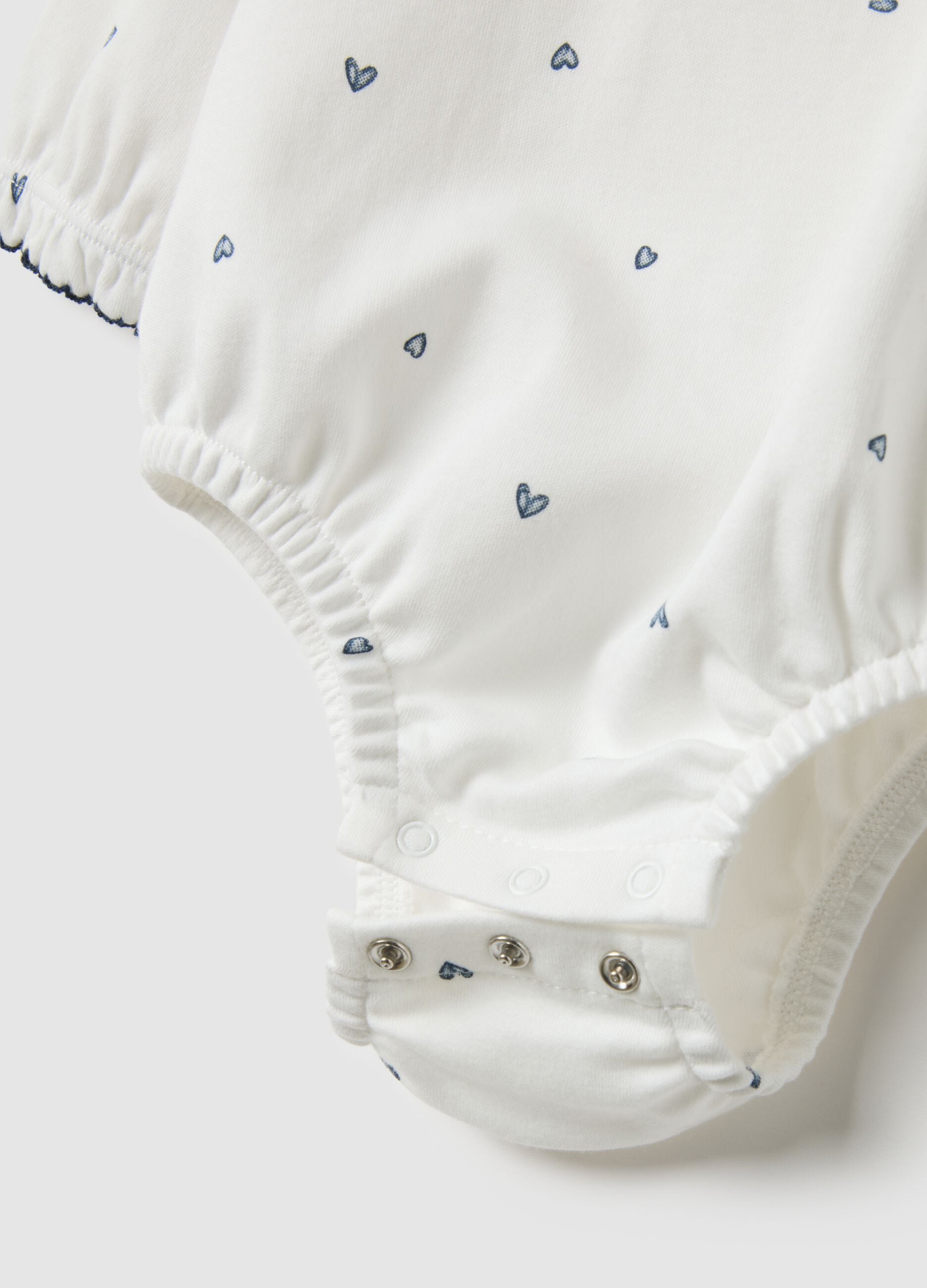Body in puro cotone bianco da neonata con colletto a volant e cuori