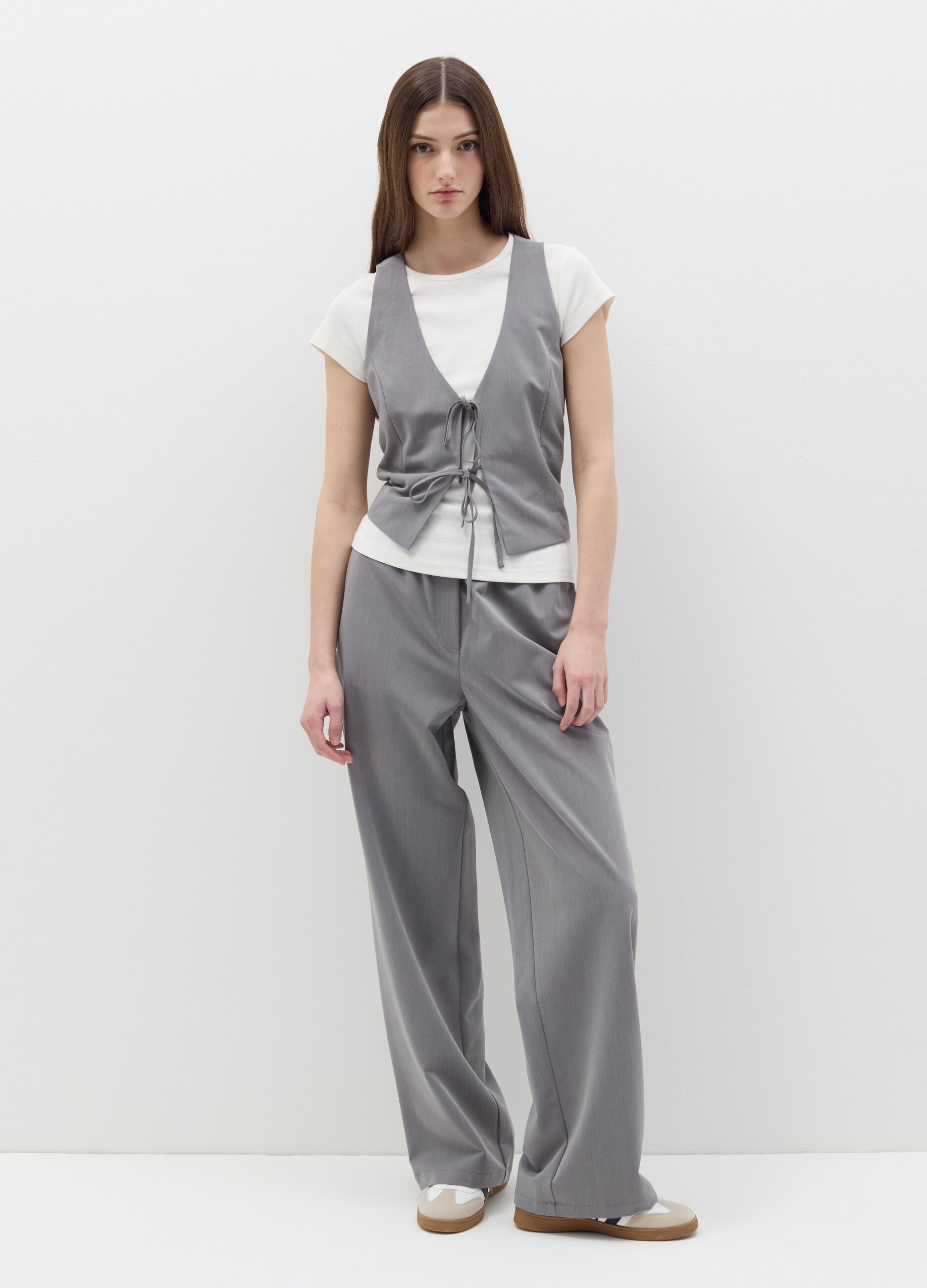 Gilet con laccetti