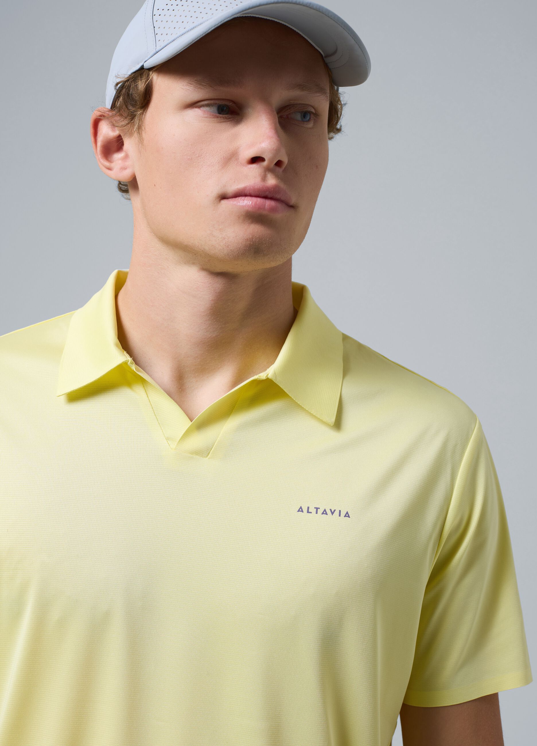 Yellow ALTAVIA COURT stretch performance polo
