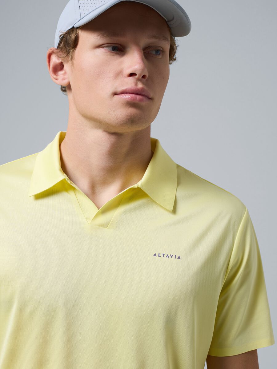 Polo sportiva gialla in tessuto elasticizzato ALTAVIA COURT_0