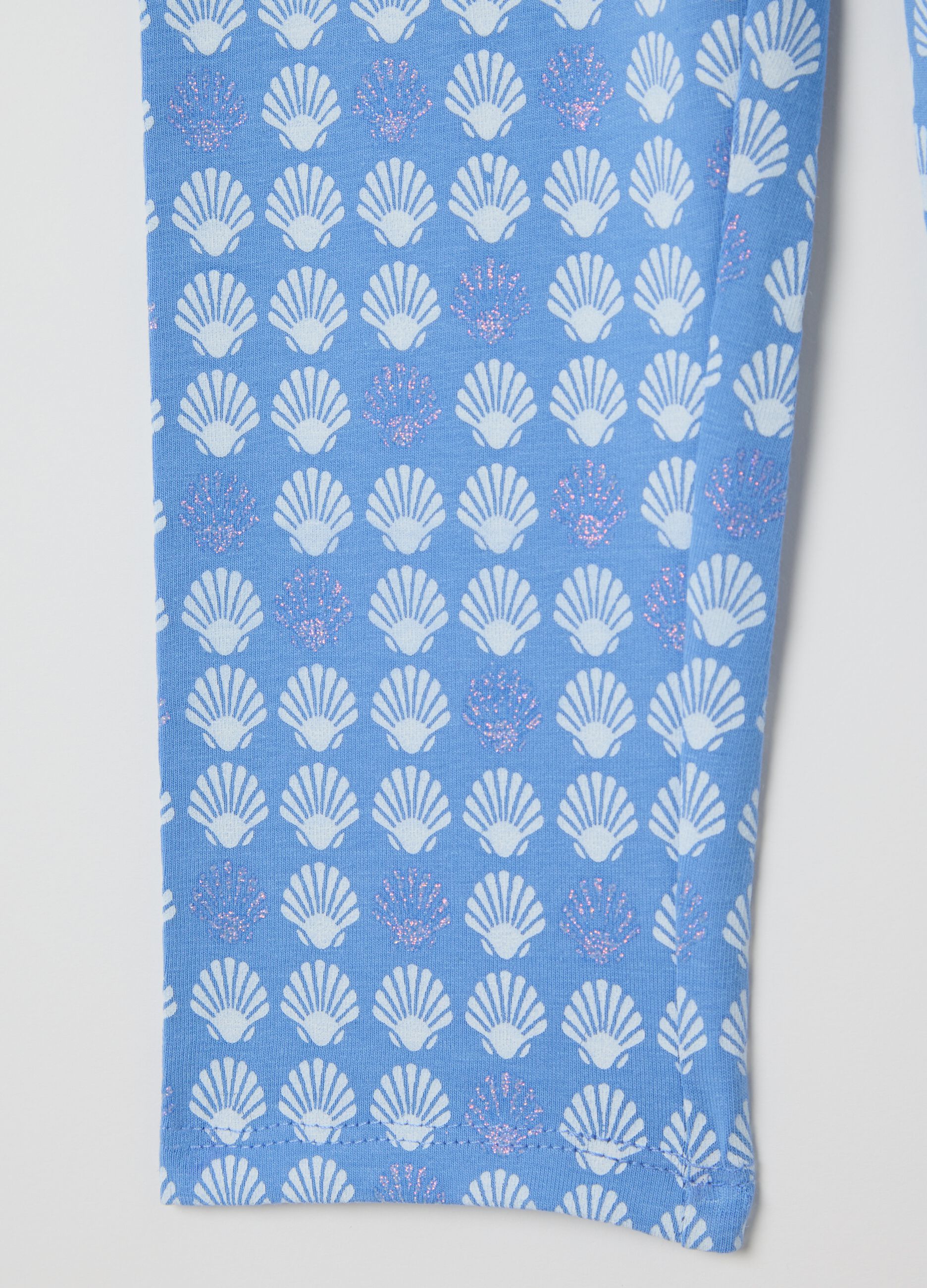Light blue three-quarter leggings in stretch cotton with print
