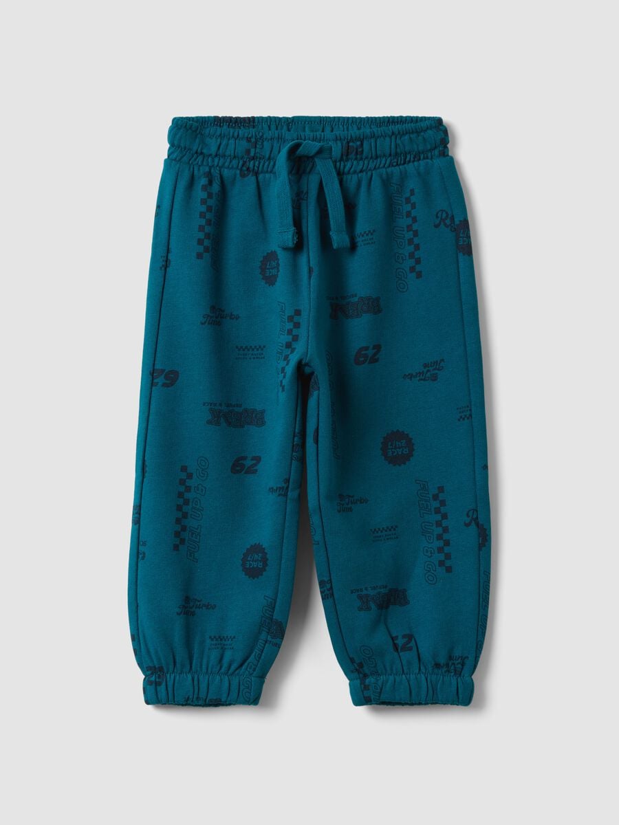 Pantaloni jogger blu in puro cotone con stampa all over_0