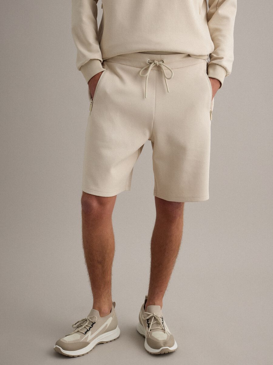 Beige regular fit stretch cotton blend bermuda shorts_1