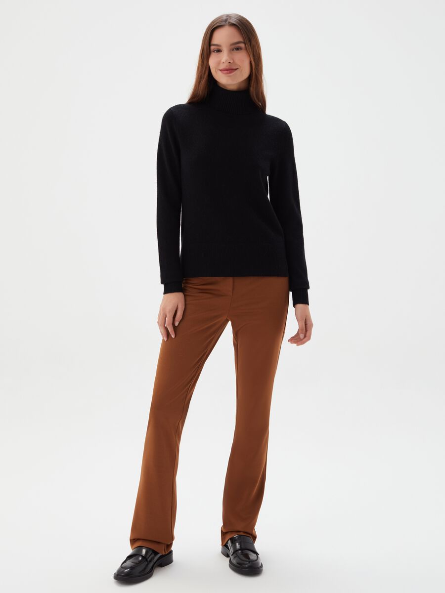 Dolcevita in cashmere con spacchi_1