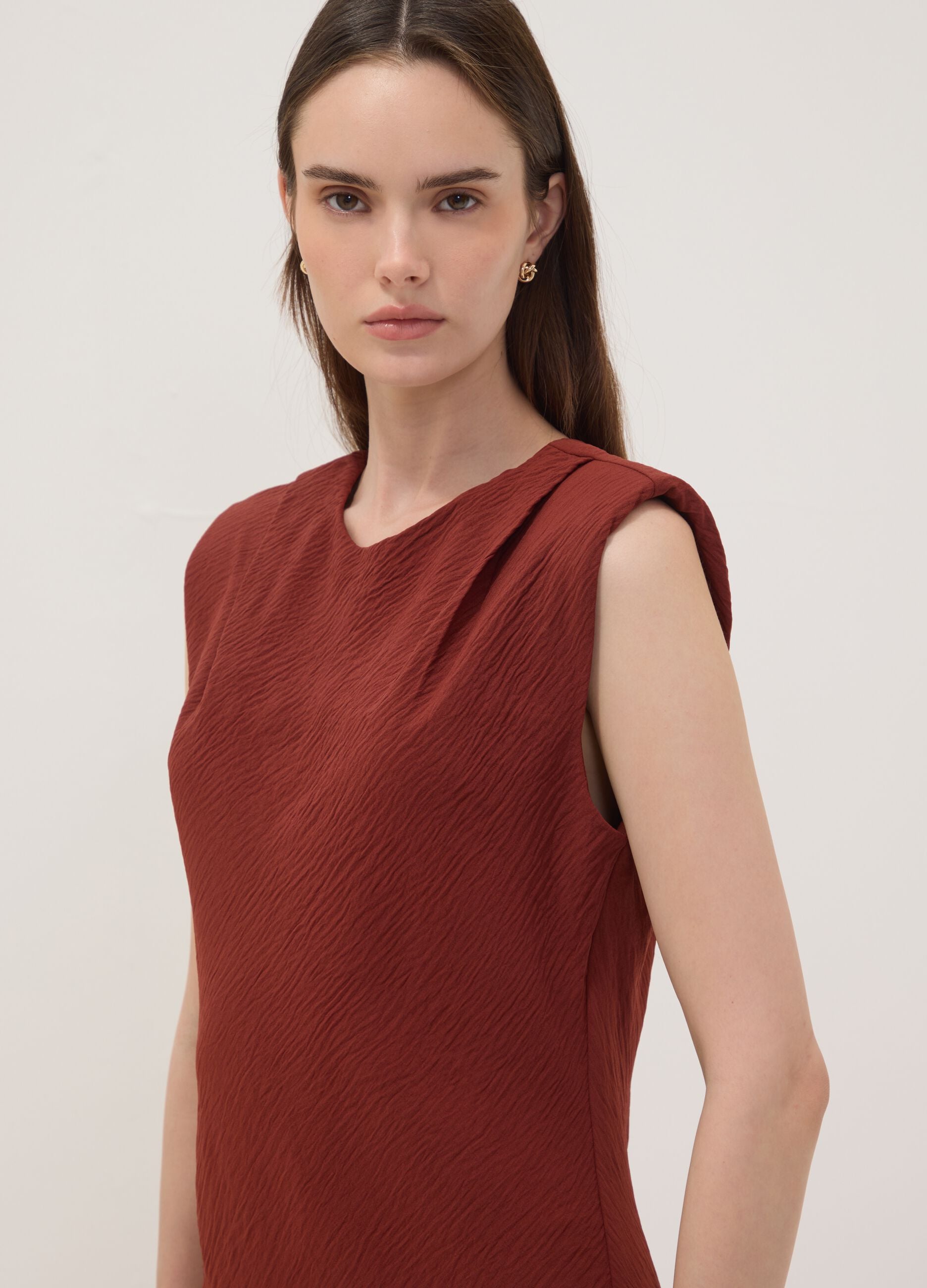 Red fitted dress with ruched detailing