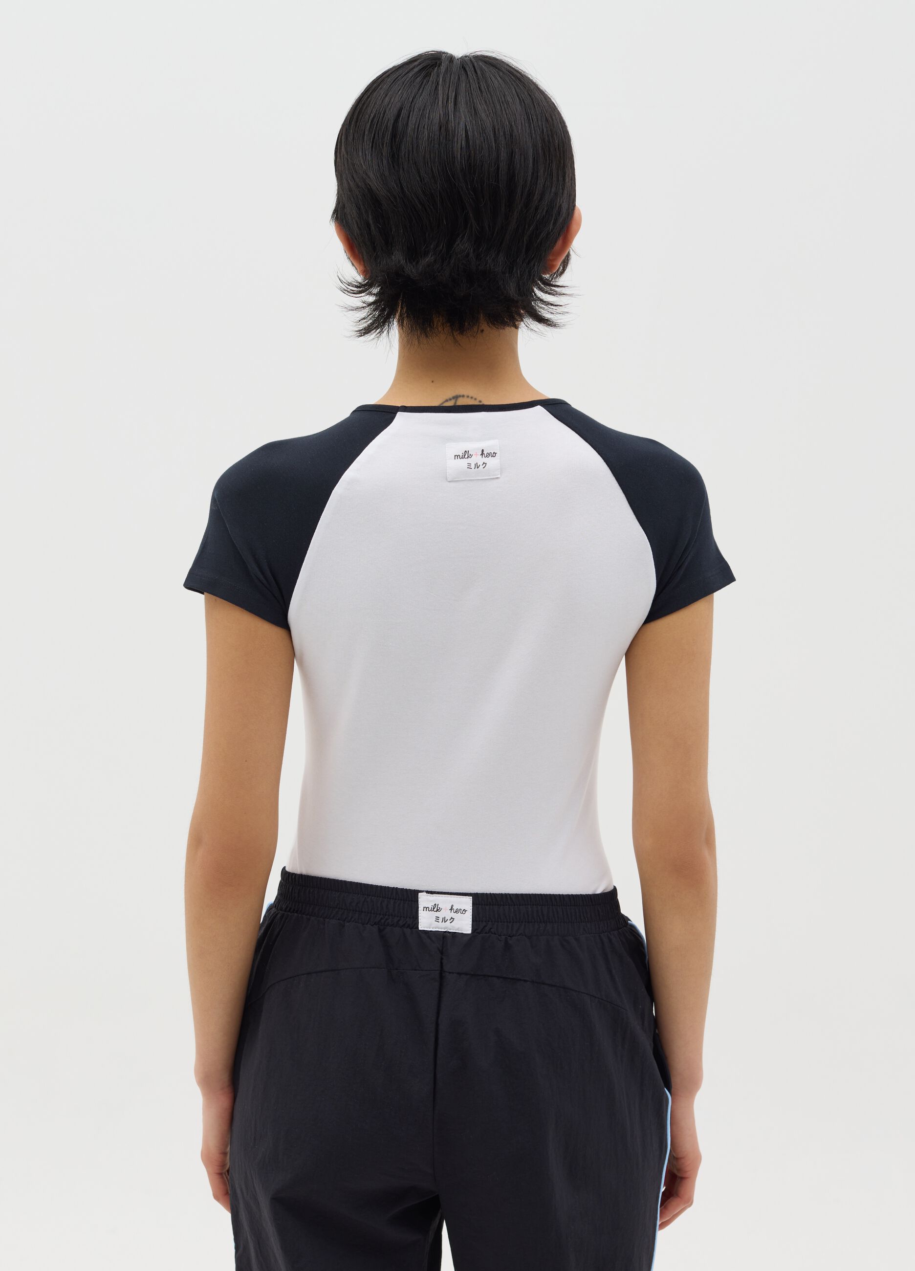 White bodysuit with short red sleeves