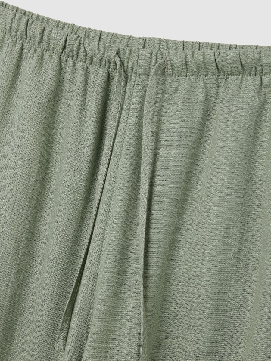 Green wide trousers made of viscose and linen_5