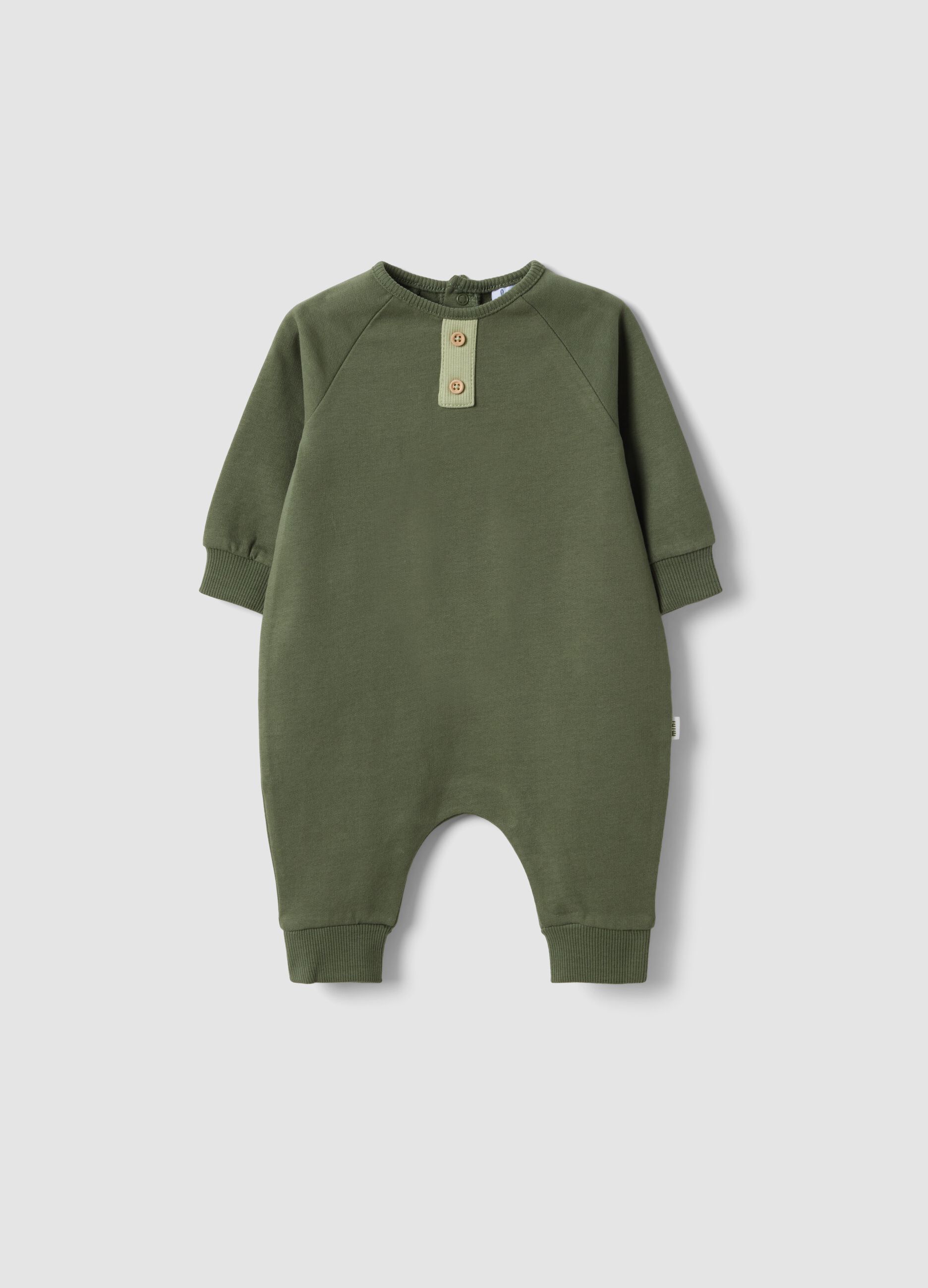 Green long-sleeved organic cotton baby sleepsuit