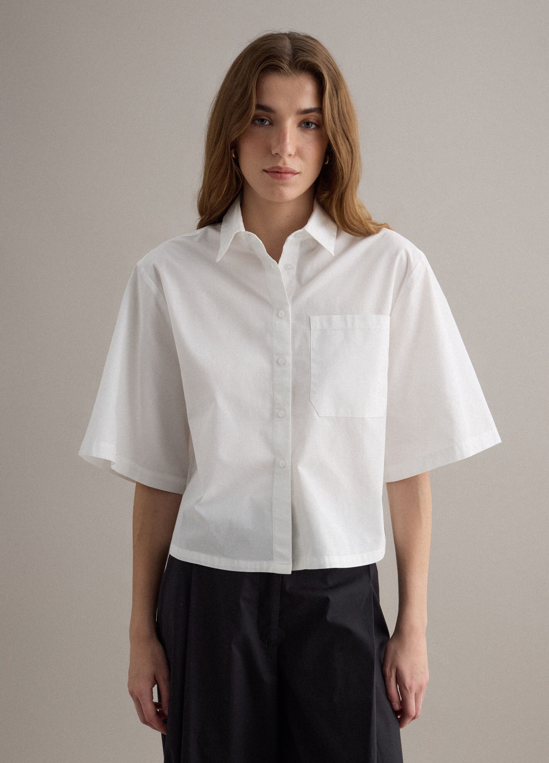 White pure-cotton shirt with patch pocket and oversized fit