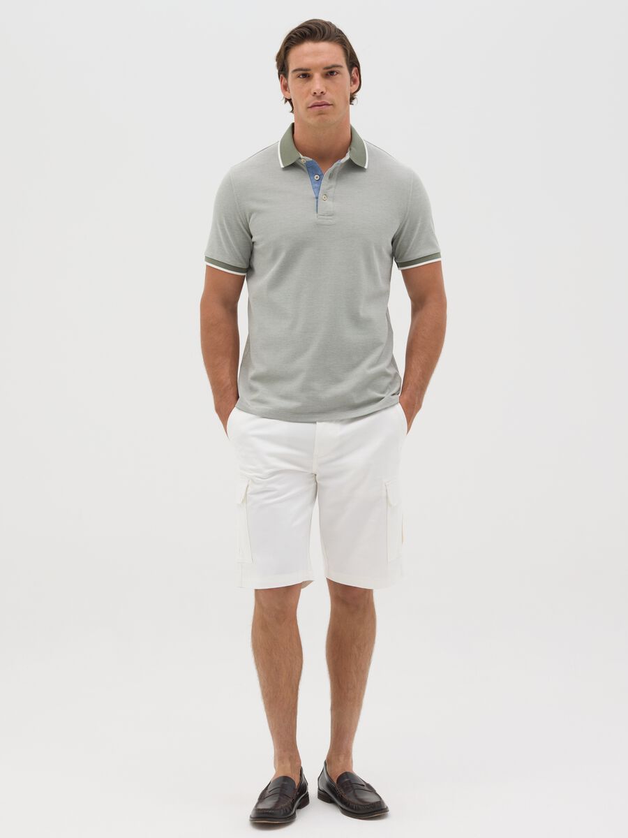 Green polo shirt with short sleeves in cotton piquet_1