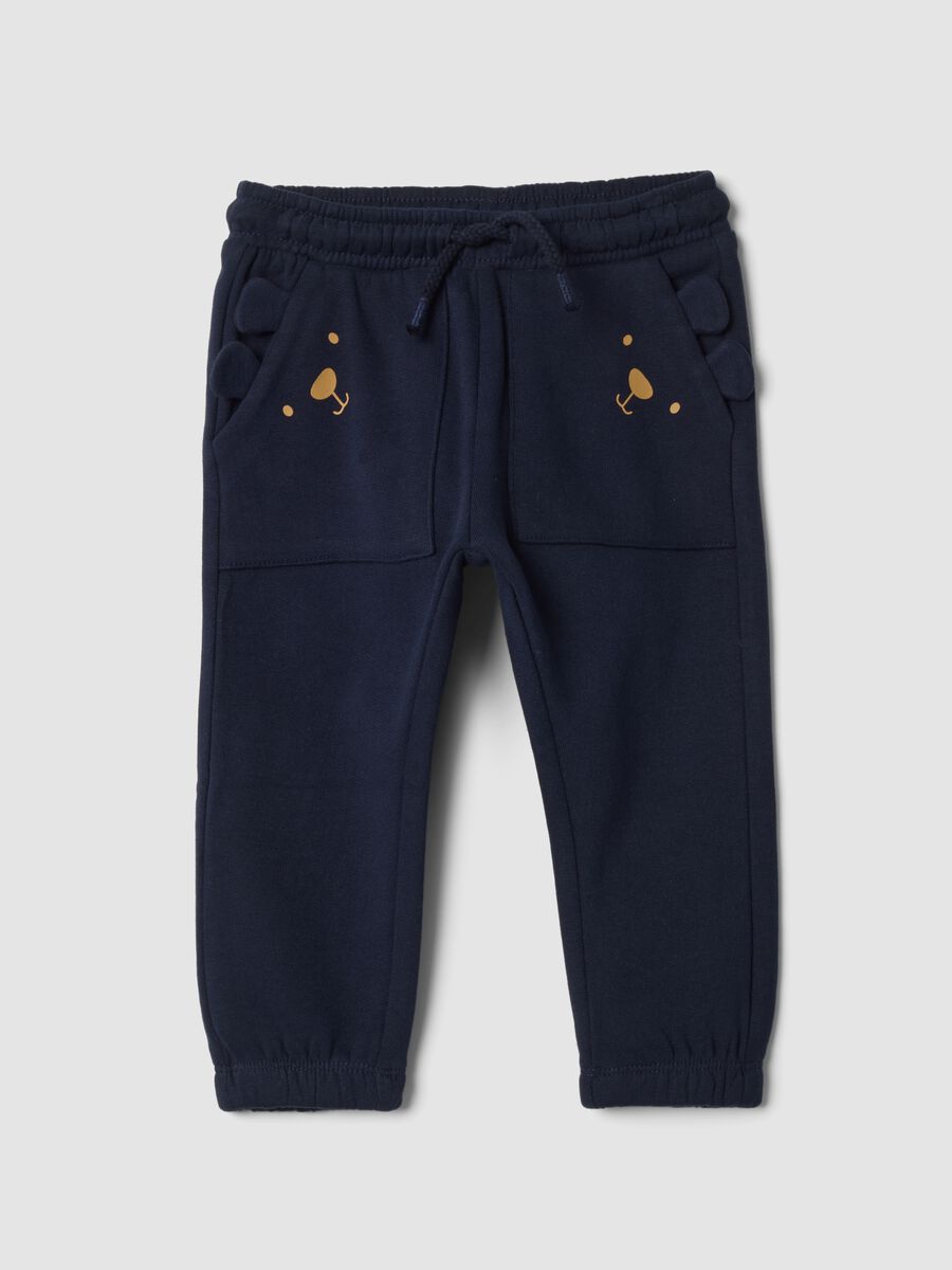 Pantaloni jogger blu in puro cotone con motivo animalier_0