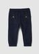 Pantaloni jogger blu in puro cotone con motivo animalier_0