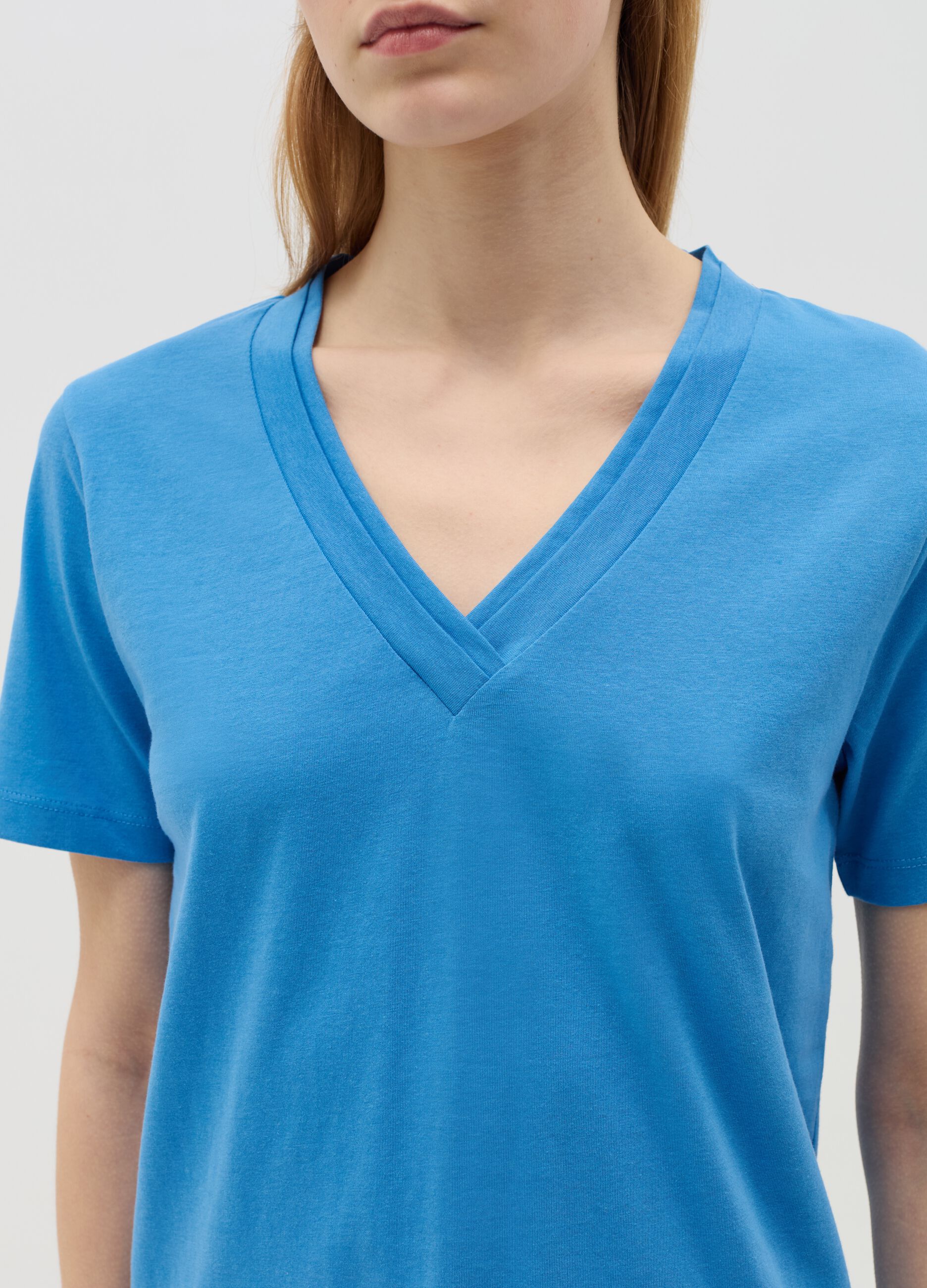 Light blue T-shirt with V neck