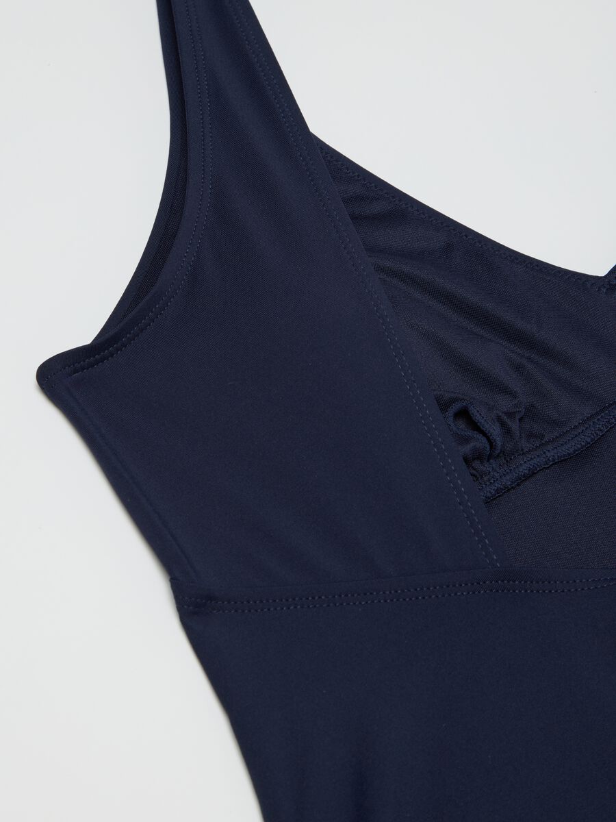 Women’s one-piece swimsuit in stretch blue fabric without padding_5