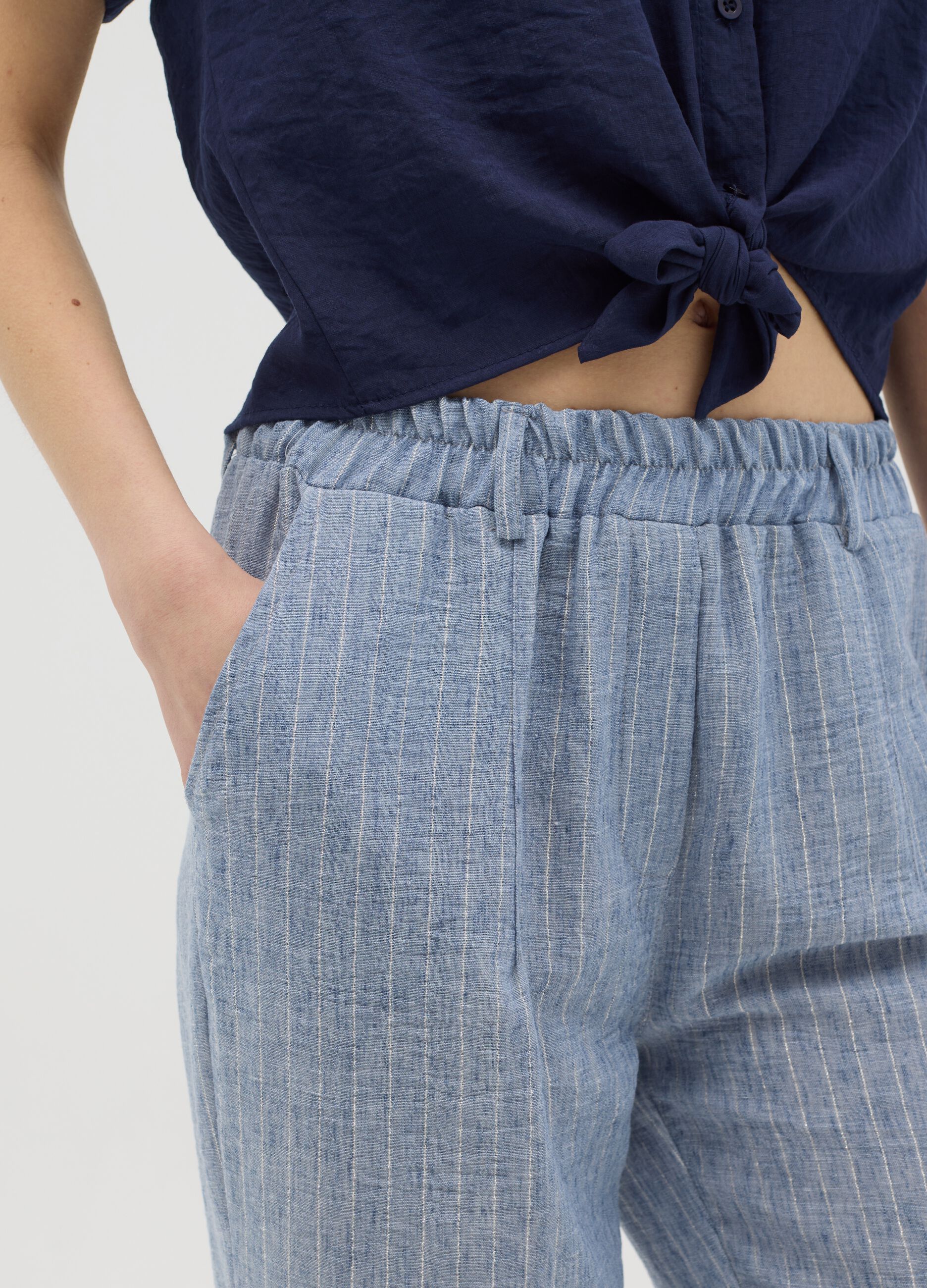 Blue trousers in stretch fabric
