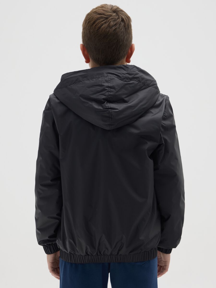 Giubbotto da ragazzo in nero water repellent_1