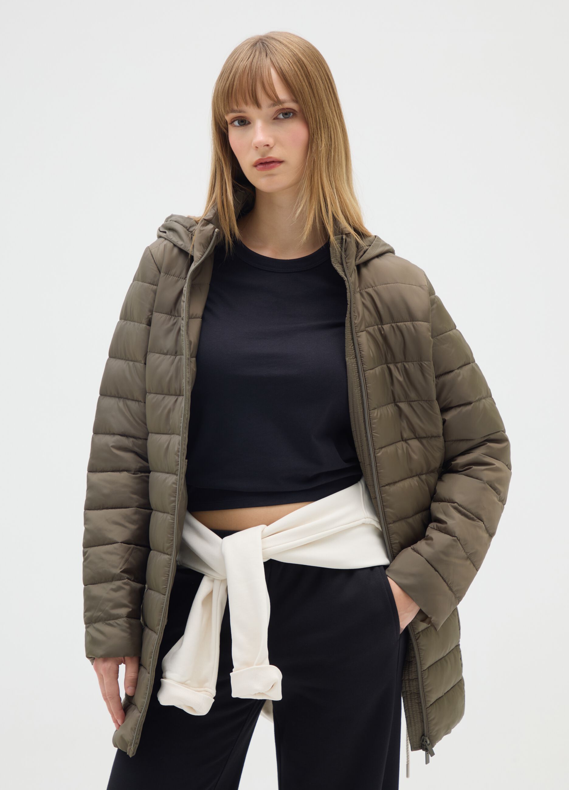 Long padded green jacket with hood and zip