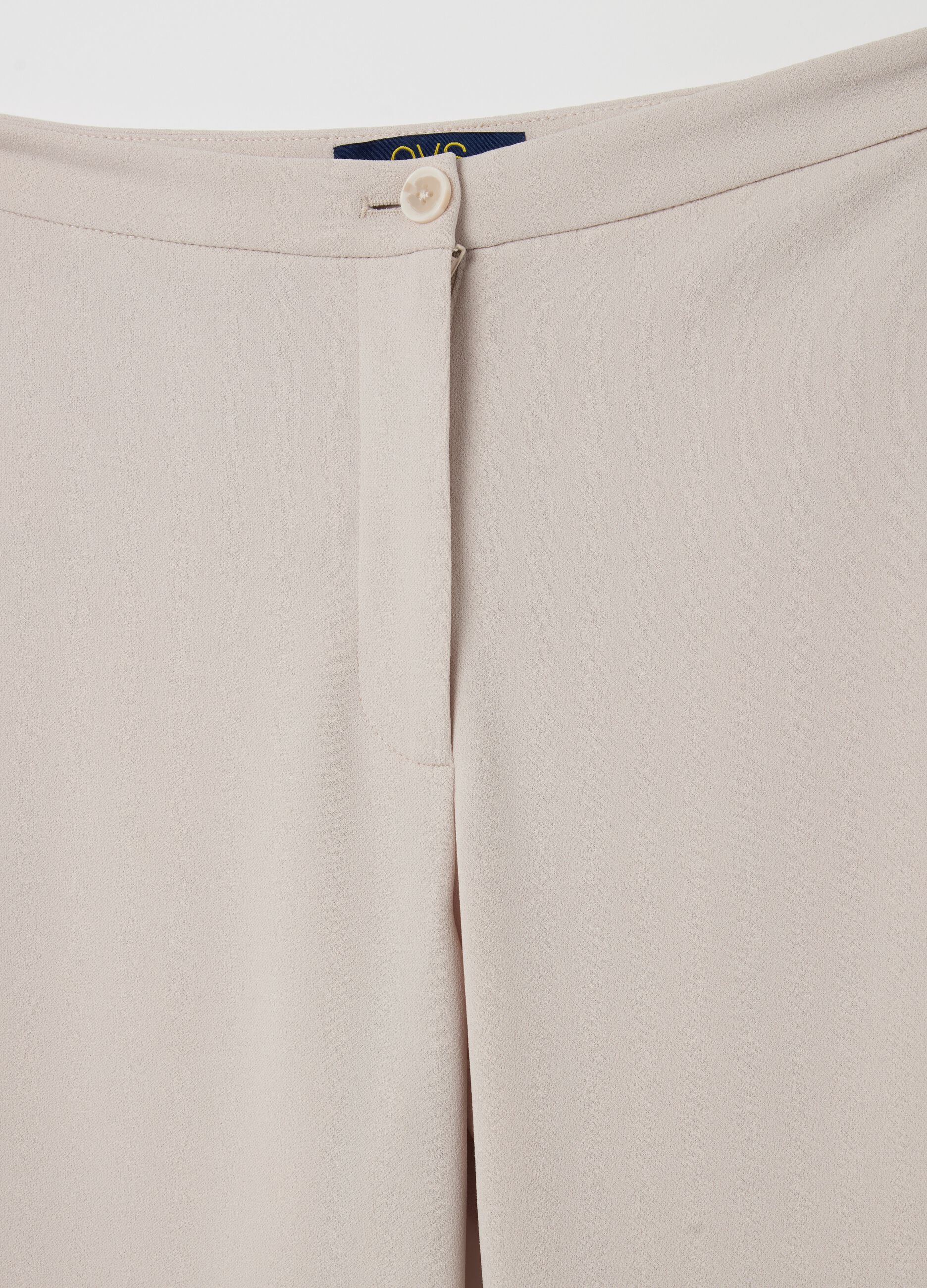 Solid colour flare-fit trousers