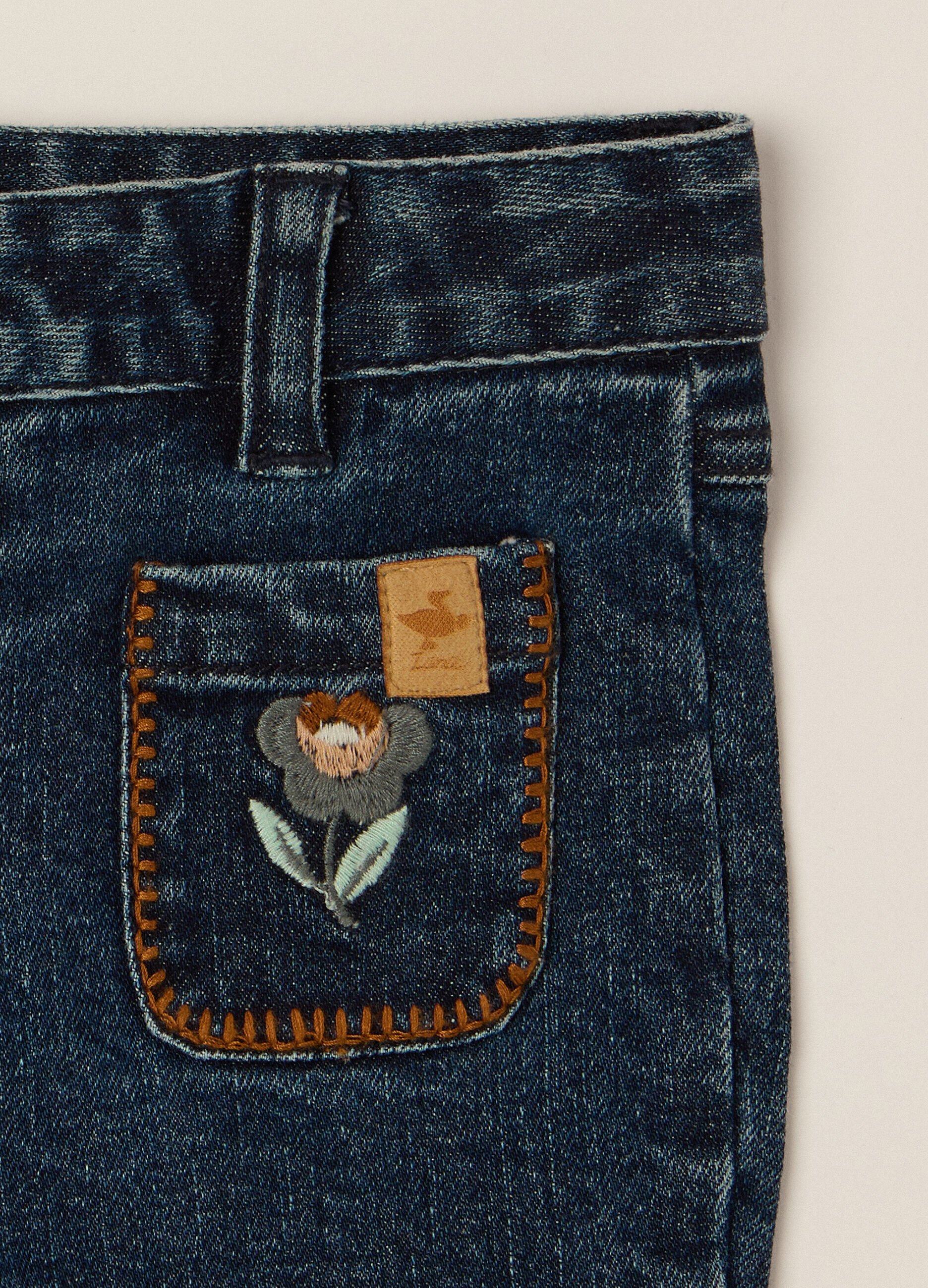 Flared Stretch Denim Trousers