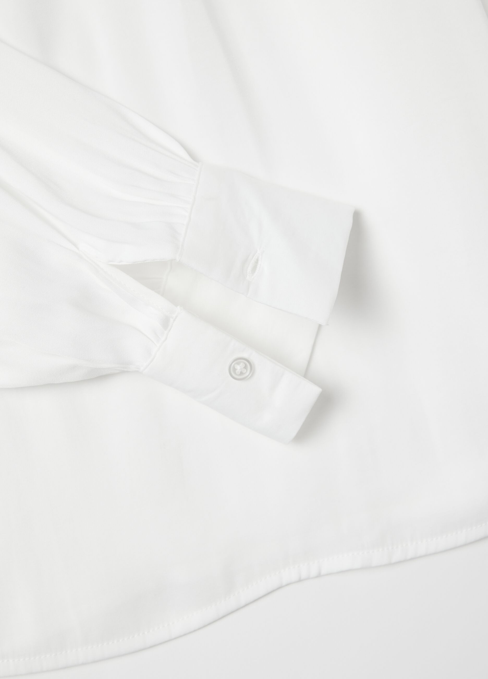 White blouse with bow