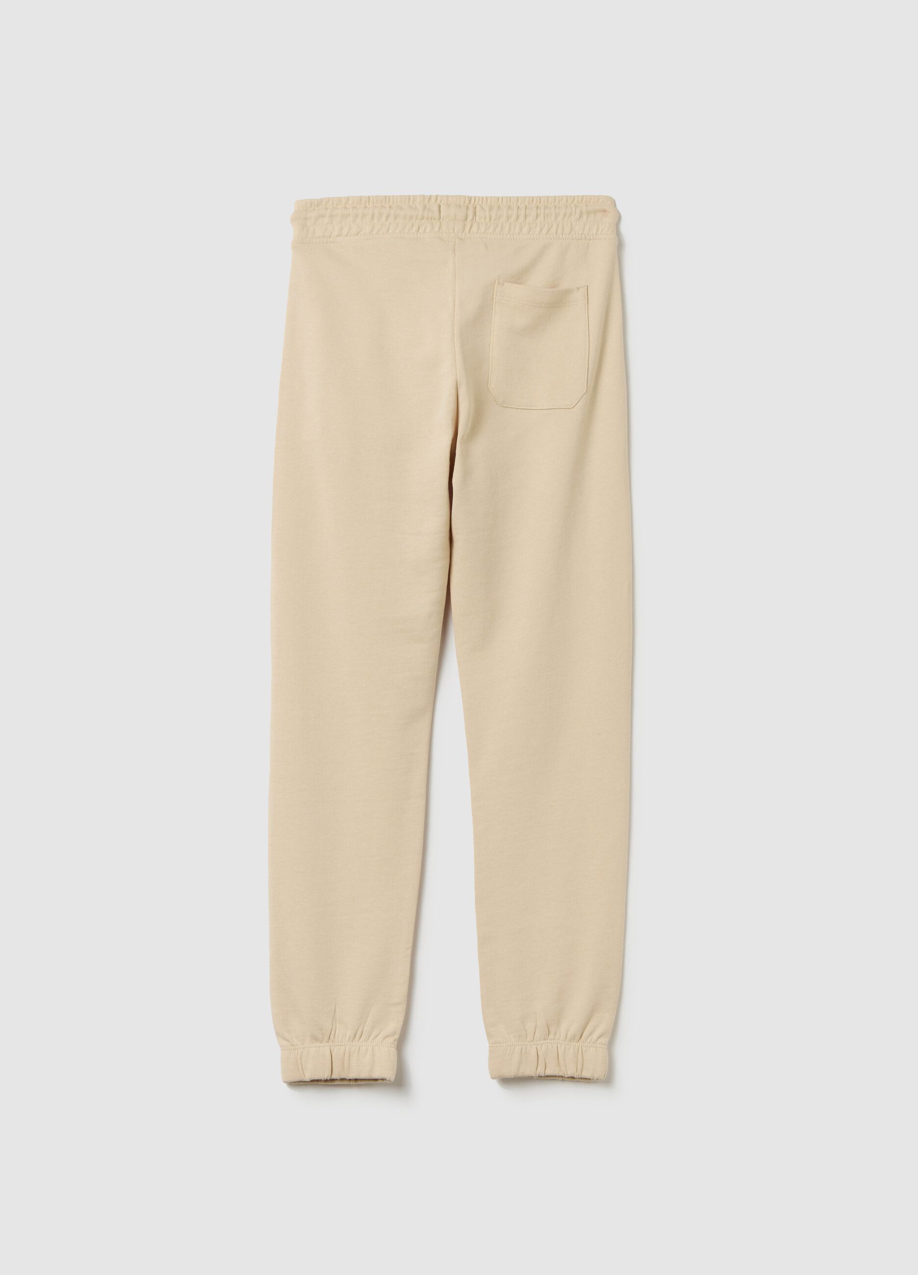 Joggers with drawstring and "Step Aside" print