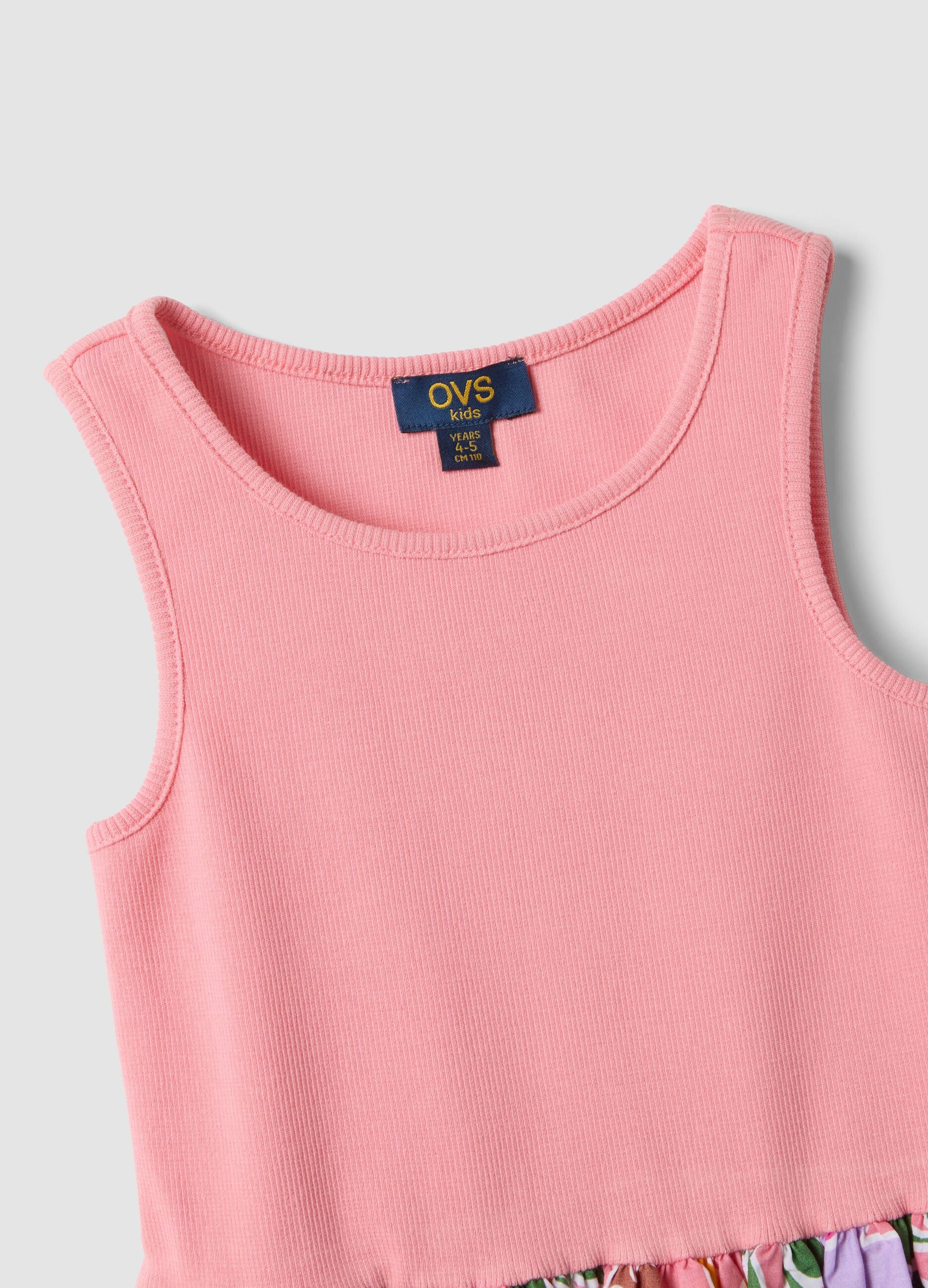 Abito rosa in cotone elasticizzato con gonna fantasia floreale per bambina