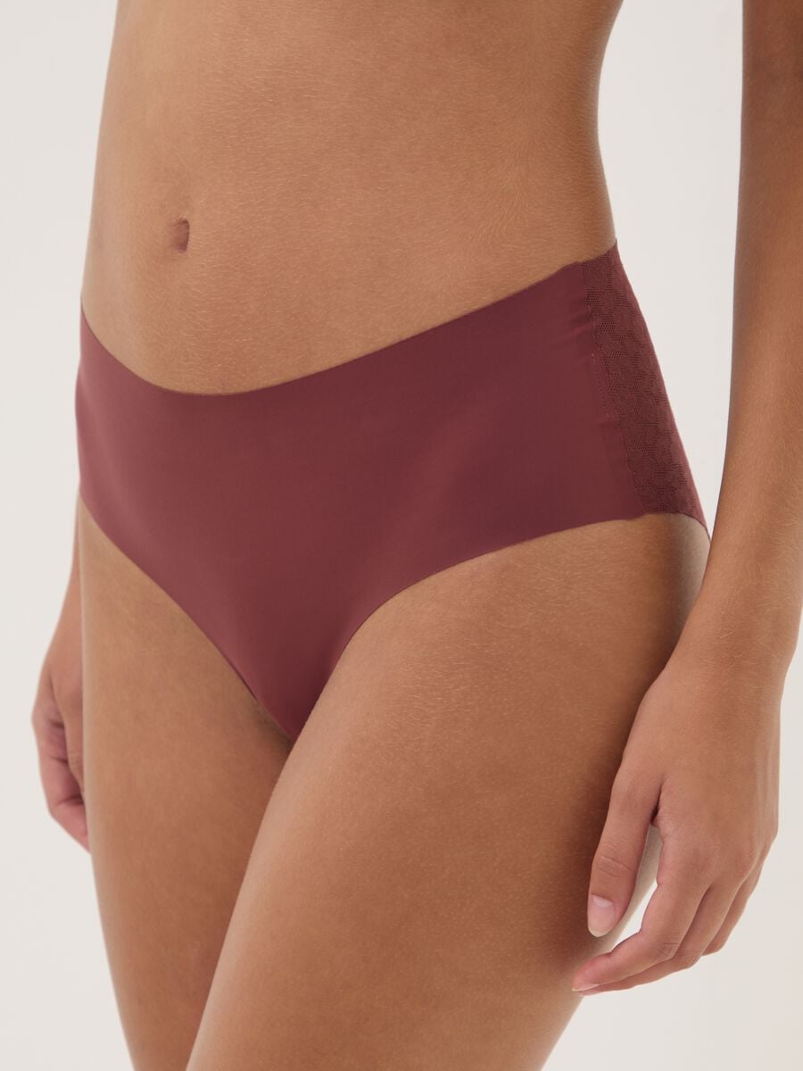 Slip rosso in tessuto elasticizzato con inserti floreali_2