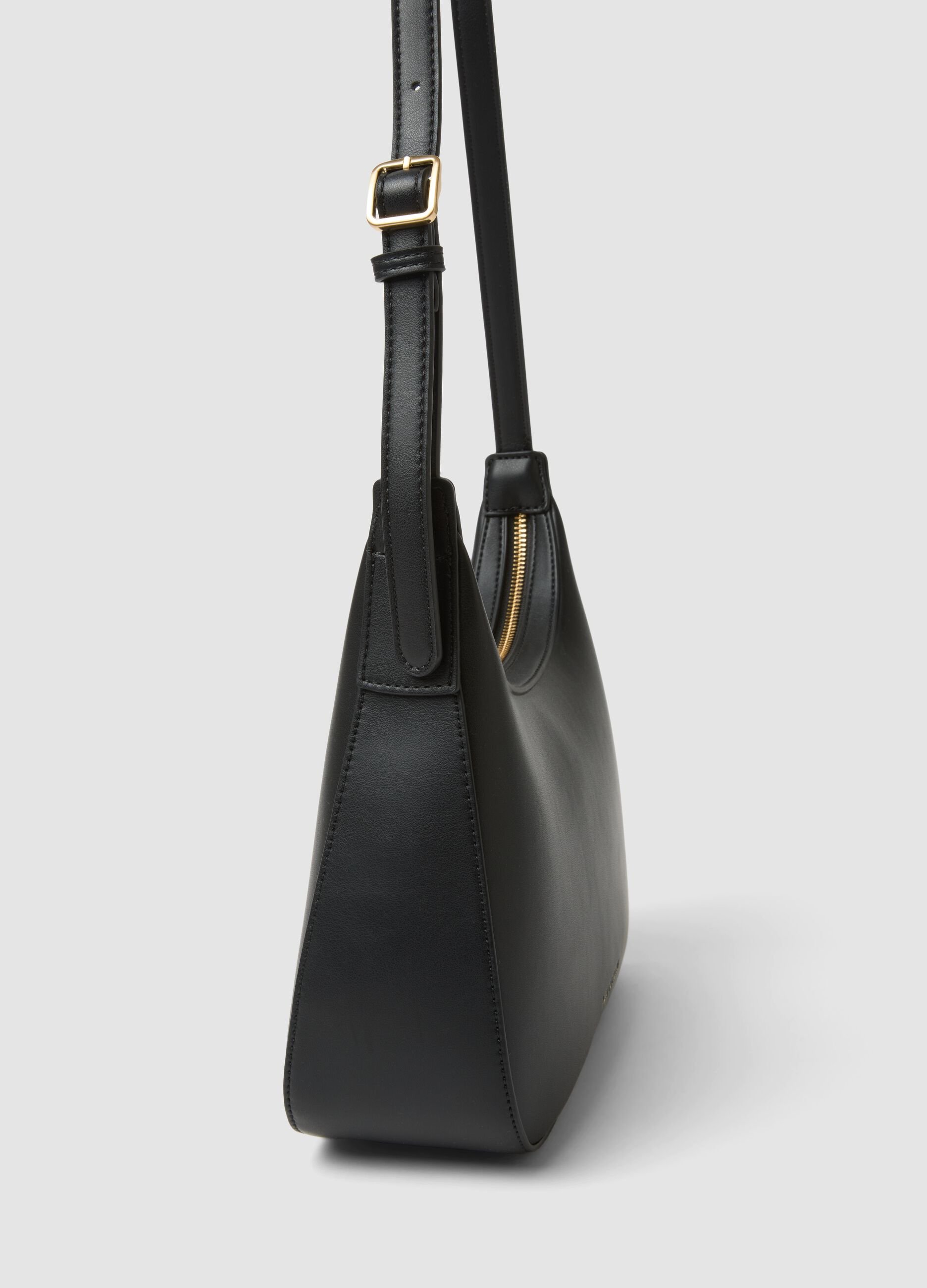Black shoulder bag with a clean, minimalist design