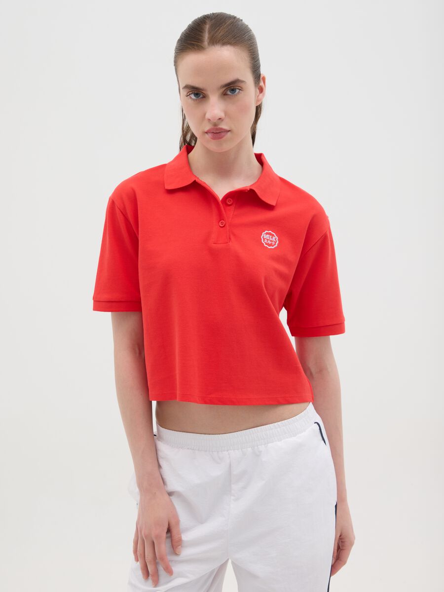 Women's red pure cotton polo with classic collar and embroidered logo in regular fit_0