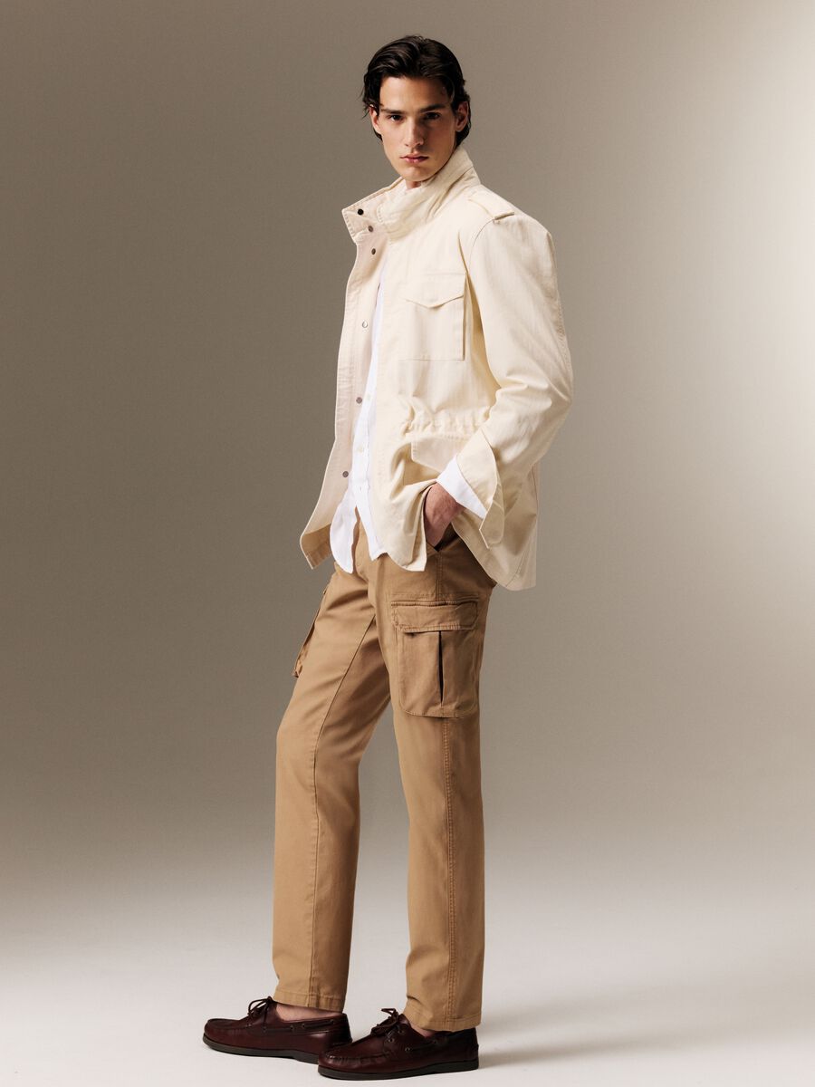 Pantaloni cargo beige in cotone elasticizzato slim fit_0