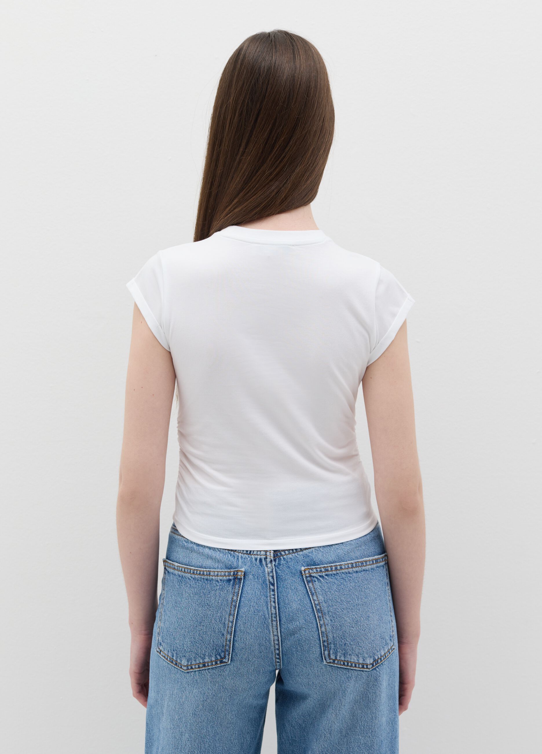 White slim-fit T-shirt with gathering on the side