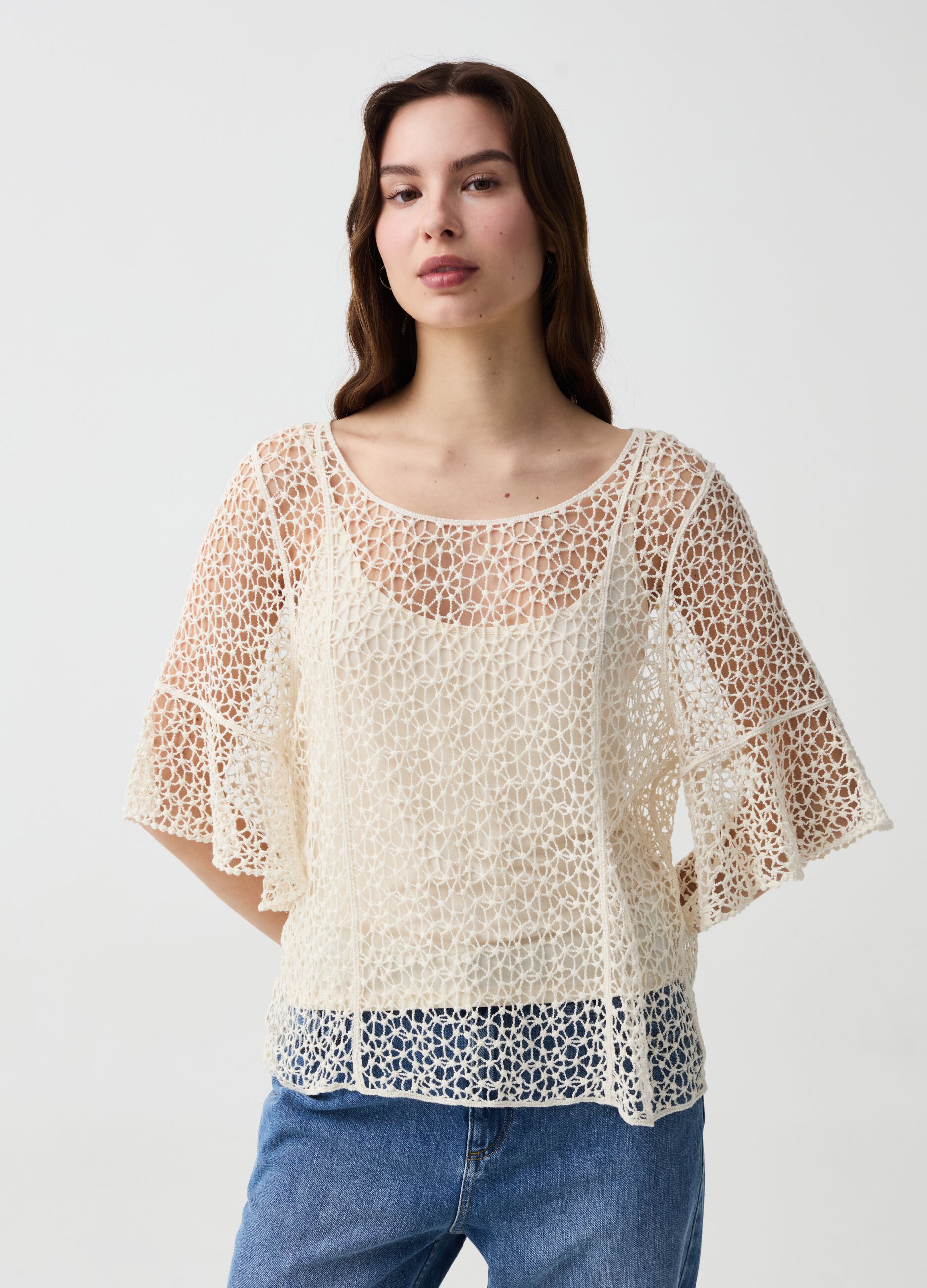 Top crochet con maniche al gomito