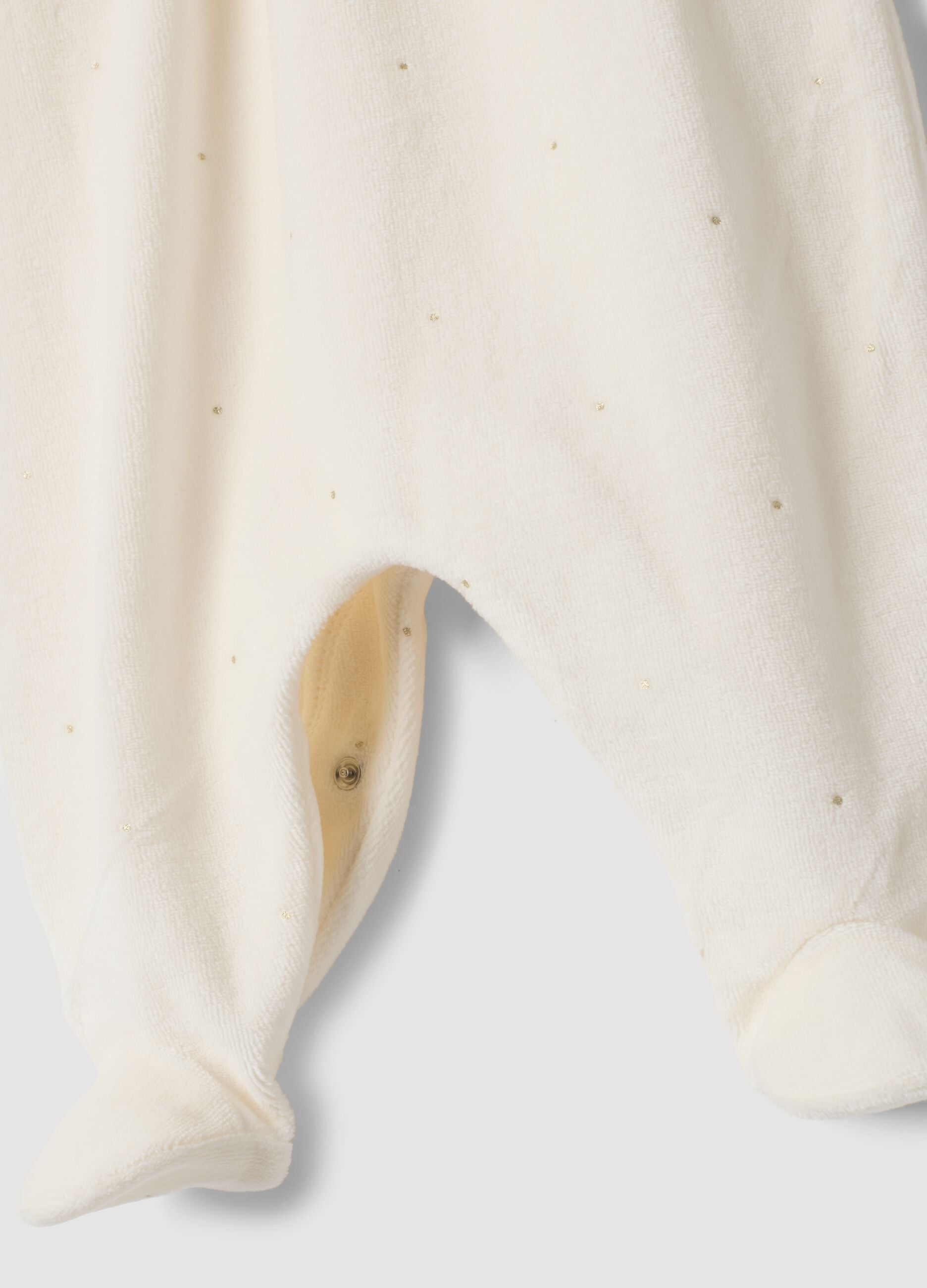 Tutina bianco sporco in misto cotone organico con piedini