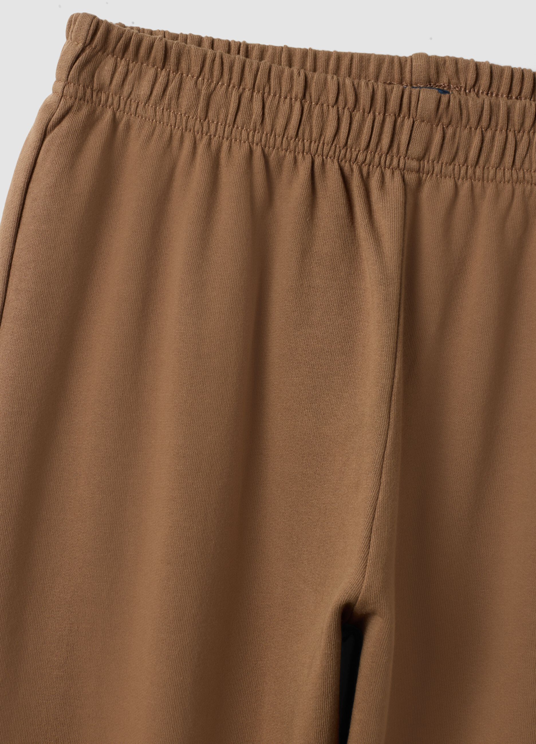 Brown jogger trousers in organic cotton and viscose blend for girls