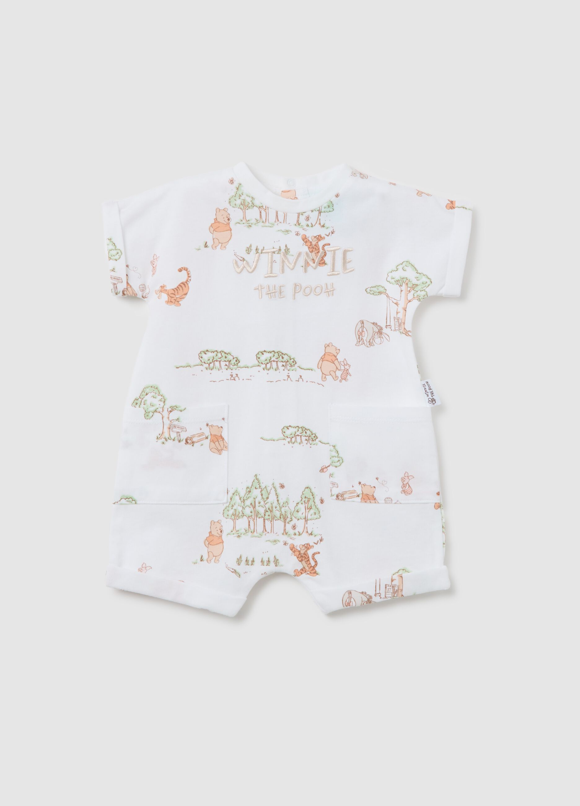 White romper suit in cotton with Winnie the Pooh embroidery and print