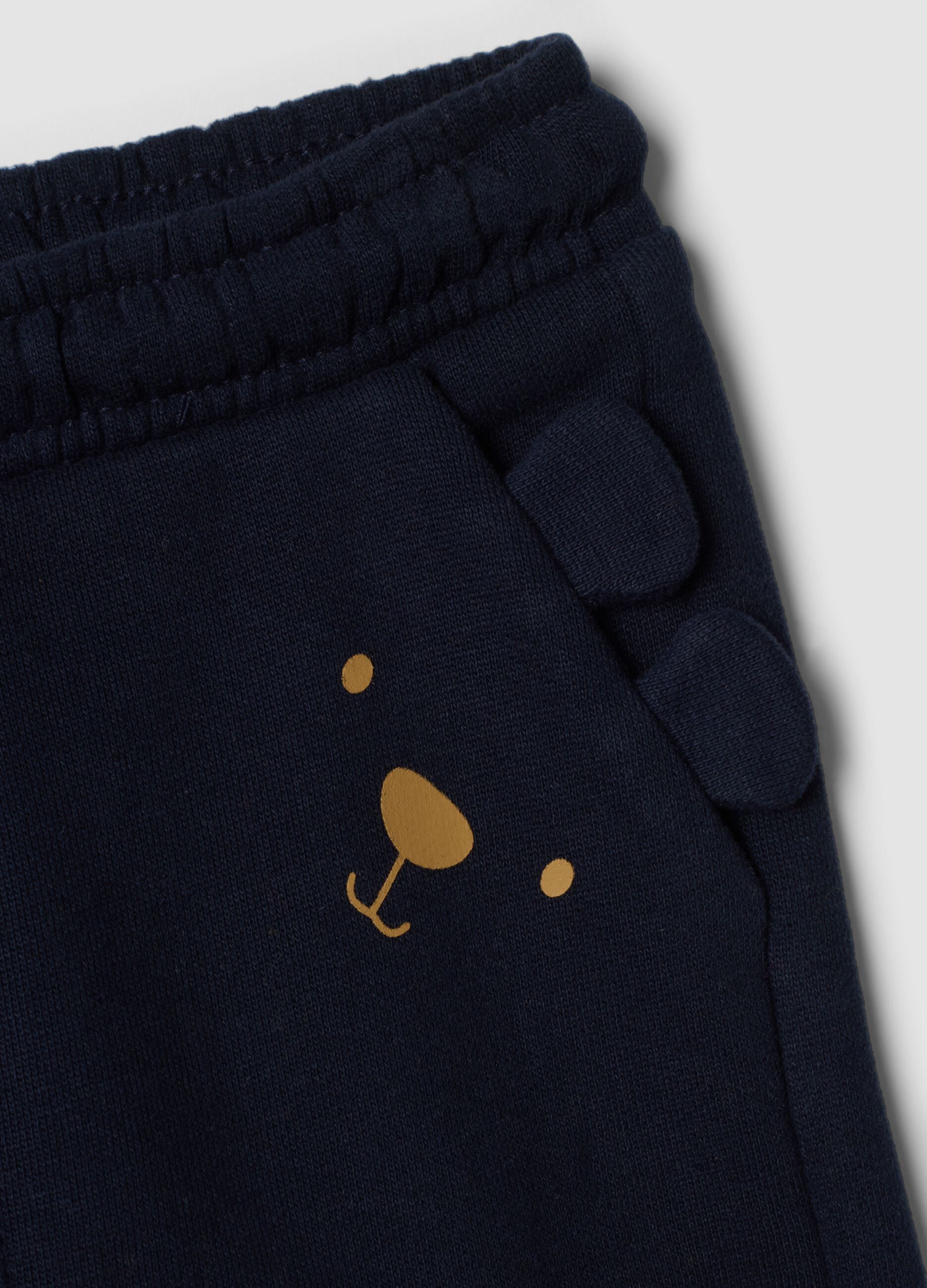Pantaloni jogger blu in puro cotone con motivo animalier