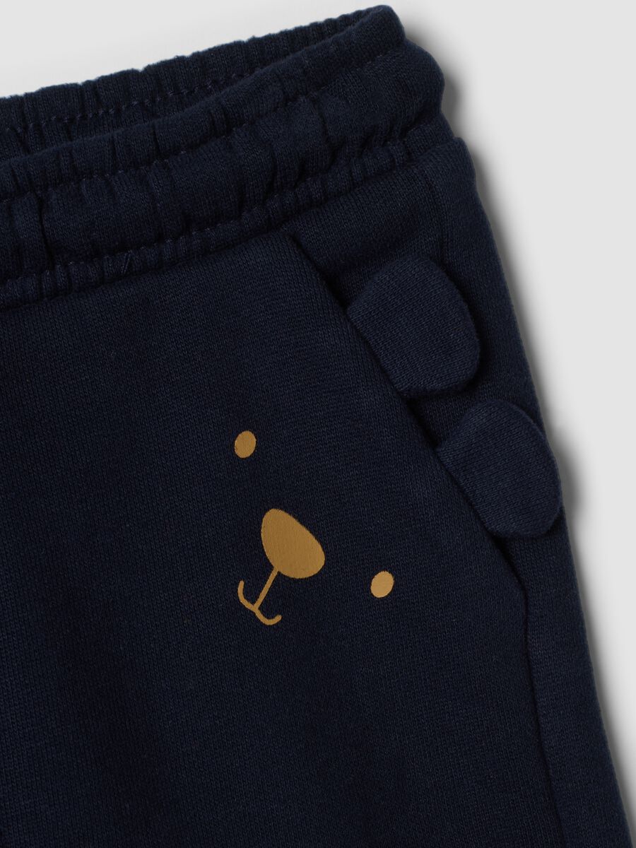 Pantaloni jogger blu in puro cotone con motivo animalier_3