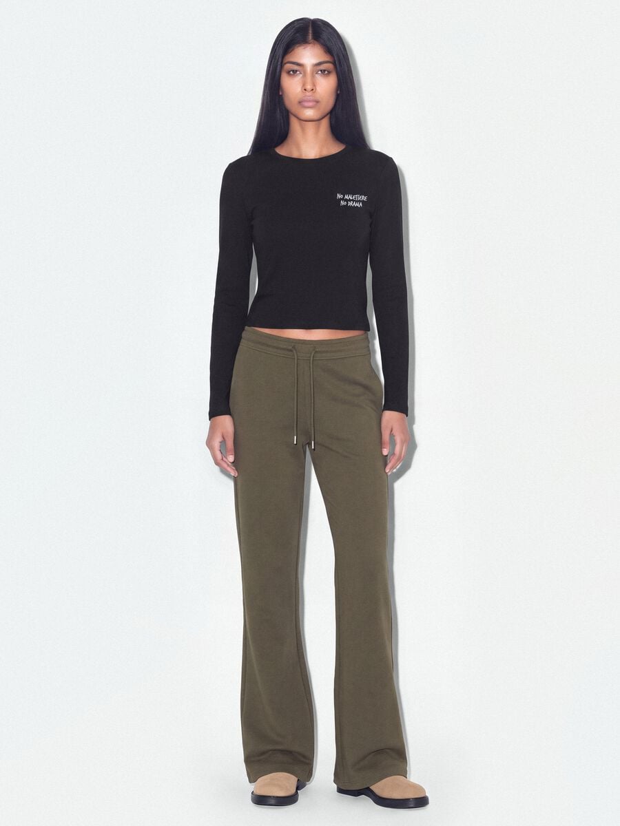 Jogger verde flare in cotone organico elasticizzato_0