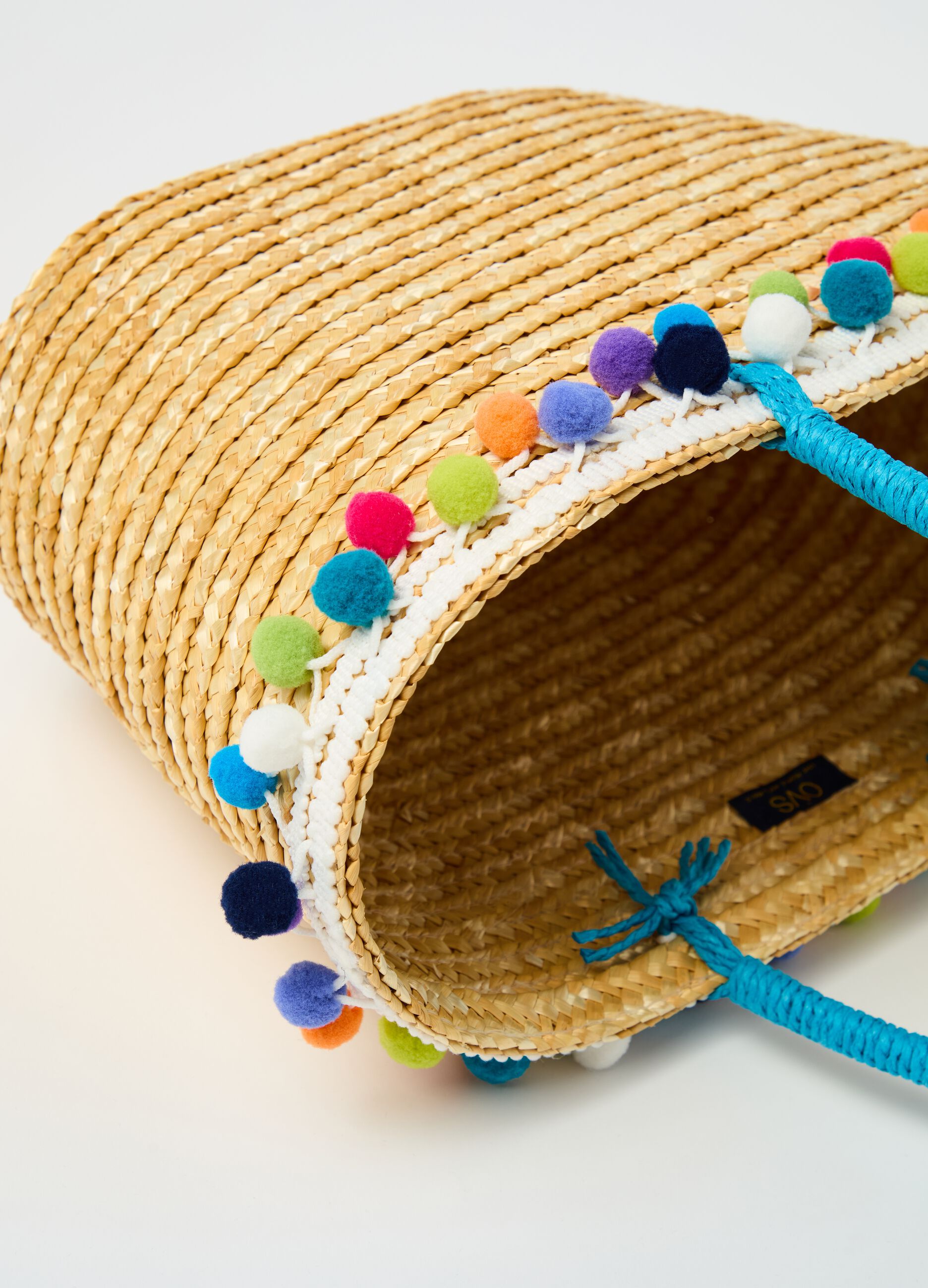 Positano straw bag with pompoms